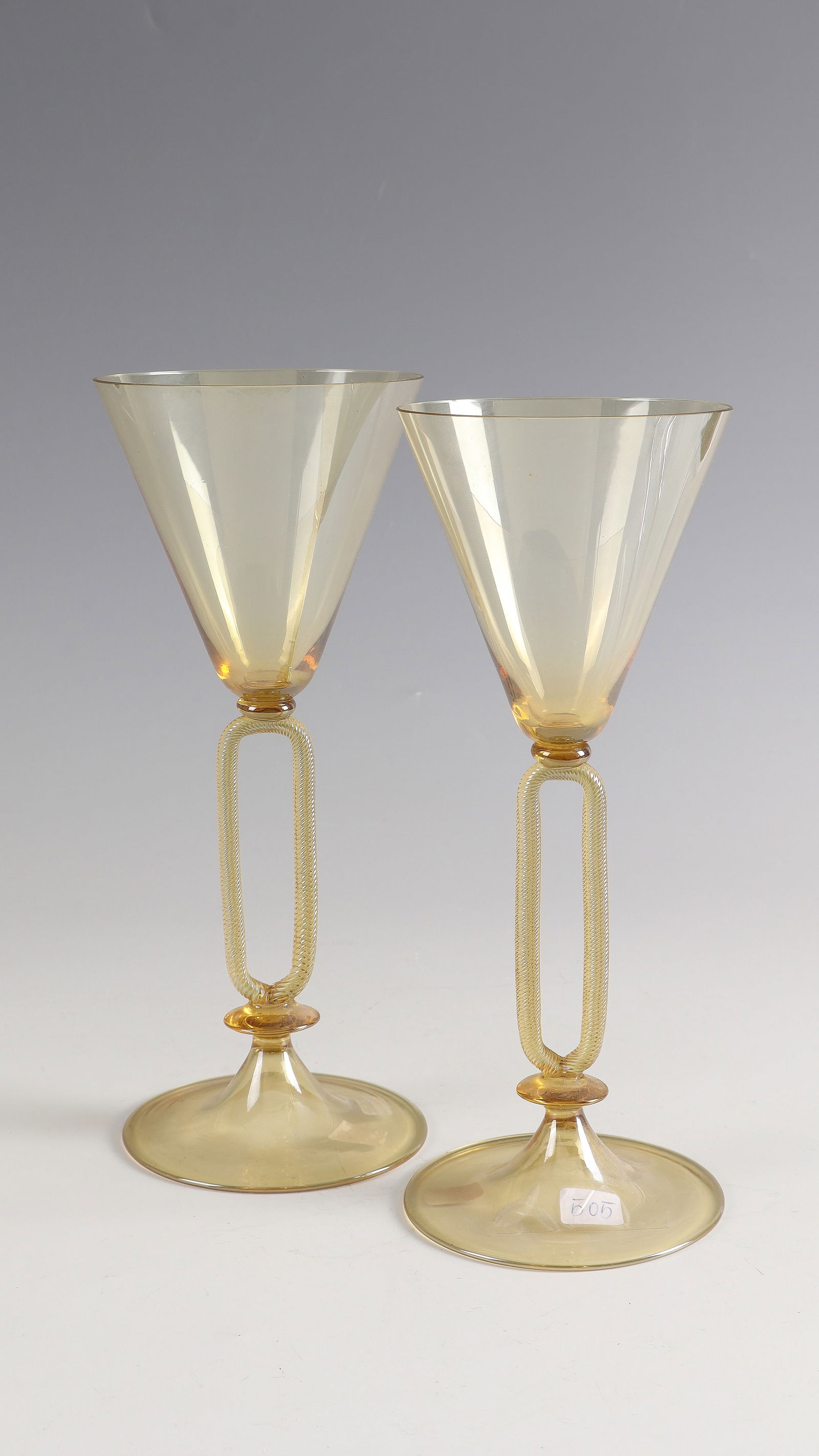 2 drinking cups: 2 Murano drinking goblets, 2nd half of the 20th century Smoky brown, thin-walled glass, lustrated. H. 23.5 or 24 cm