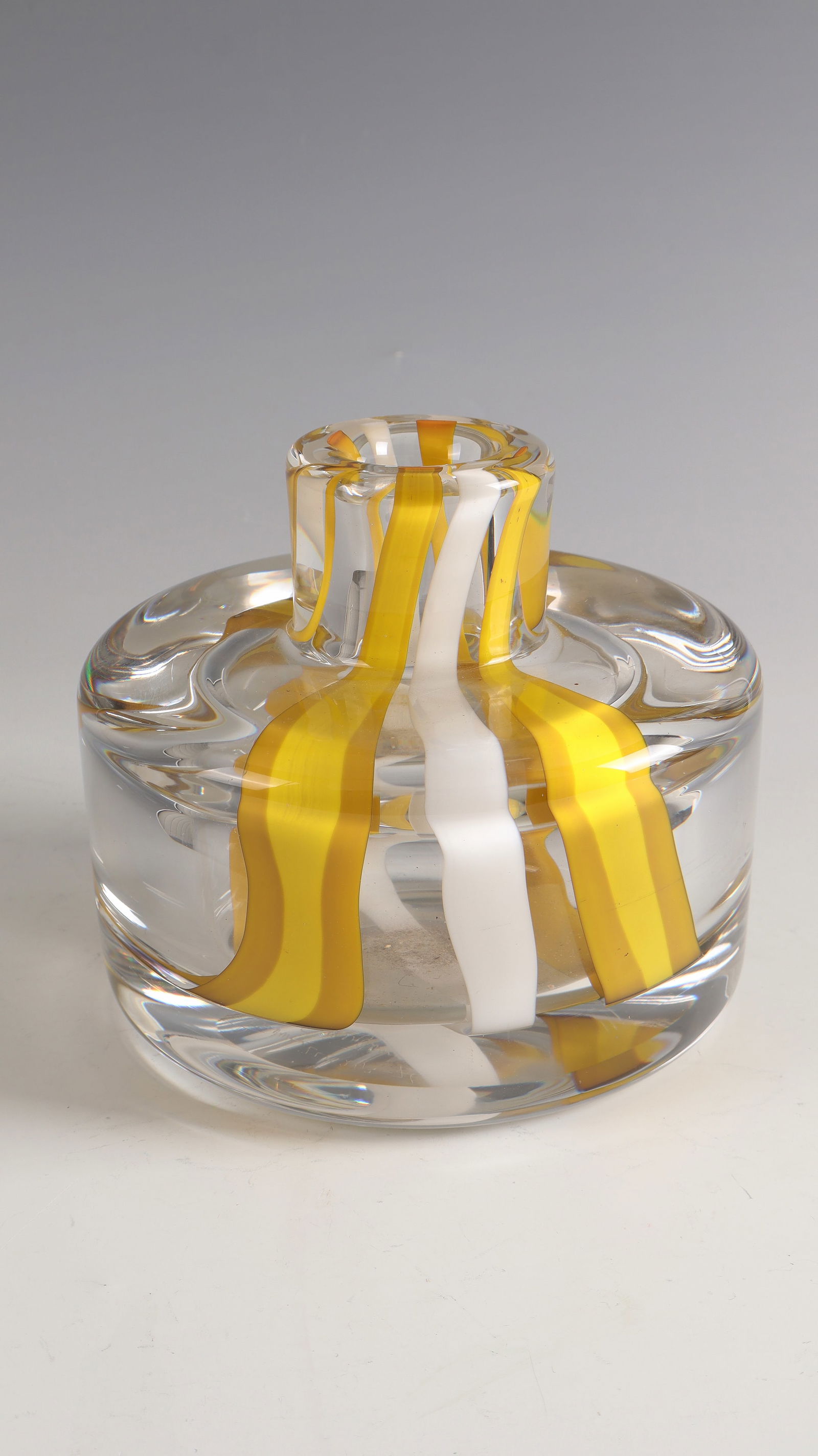 Vase ''Unica'': Vase ''Unica'' Glasfabriek Leerdam, 1976 - Design: Floris Meydam Colourless, thick-walled glass with ribbon melting in yellow and white. Underside inscribed: Leerdam LLM 243-76 Meydam (in diamond
