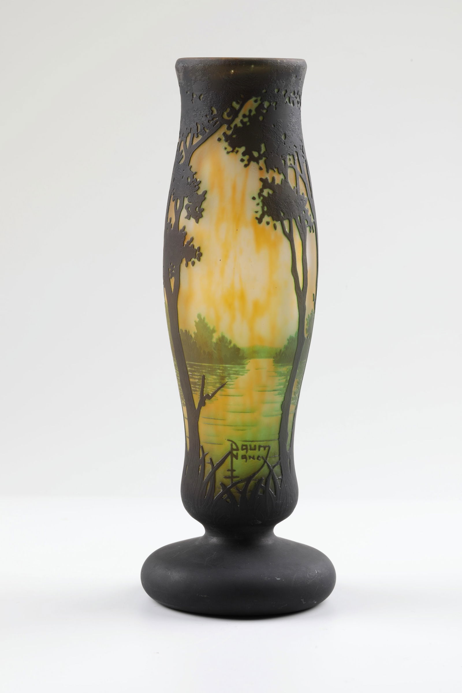 Vase ''Paysage lacustre'': Vase ''Paysage lacustre'' Daum Frères, Nancy, c. 1910-1914 Slender baluster shape with club-shaped body on a swinging foot. Colourless glass, yellow powder inclusions, light green and dark olive