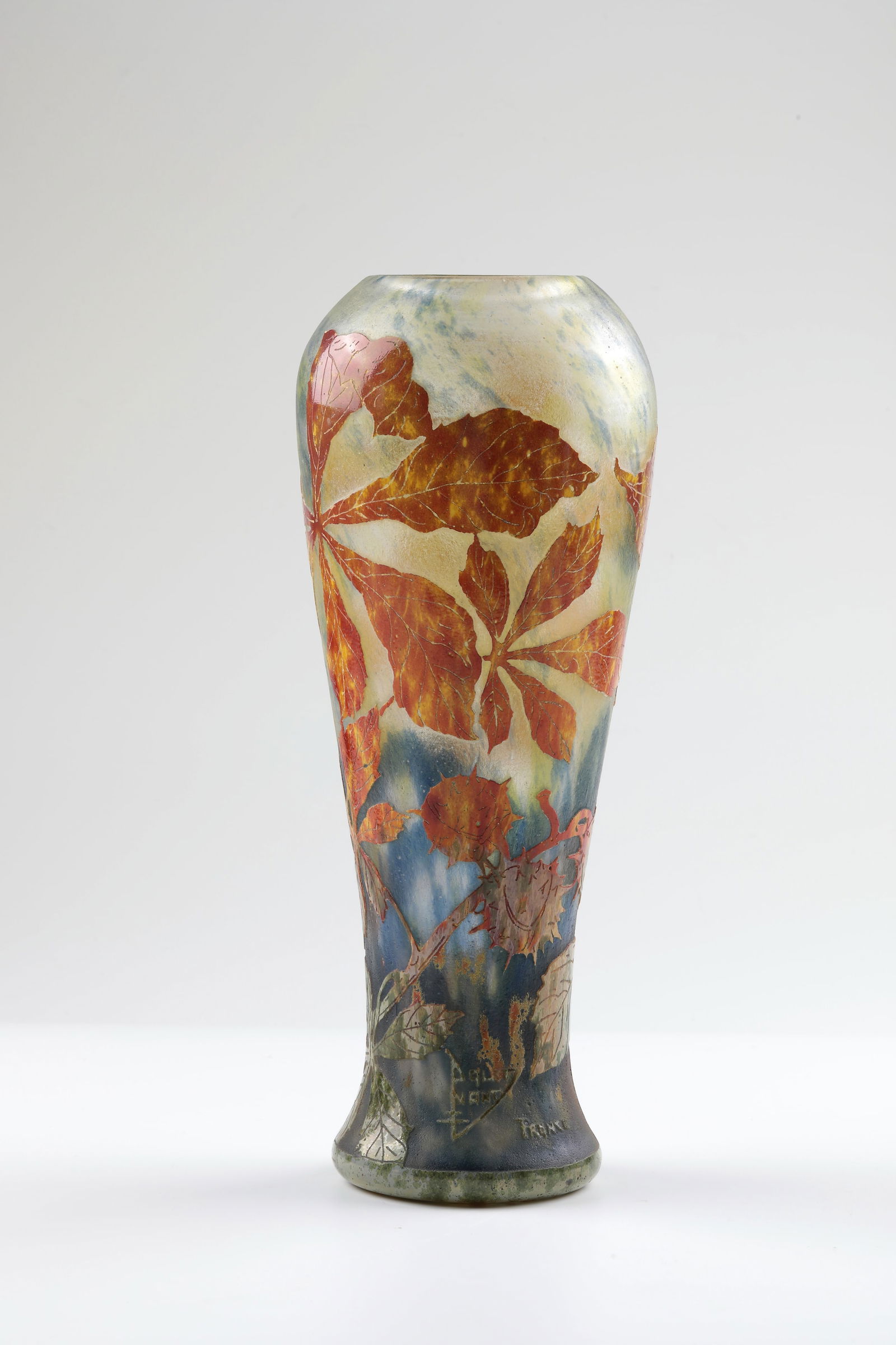 Vase ''Marronier automnale'': Vase ''Marronier automnale'' Daum Frères, Nancy, designed by Henri Bergé, c. 1913 Colourless flashed glass with powder melting in blue and yellow and enamel melting in orange, green and yellow. High