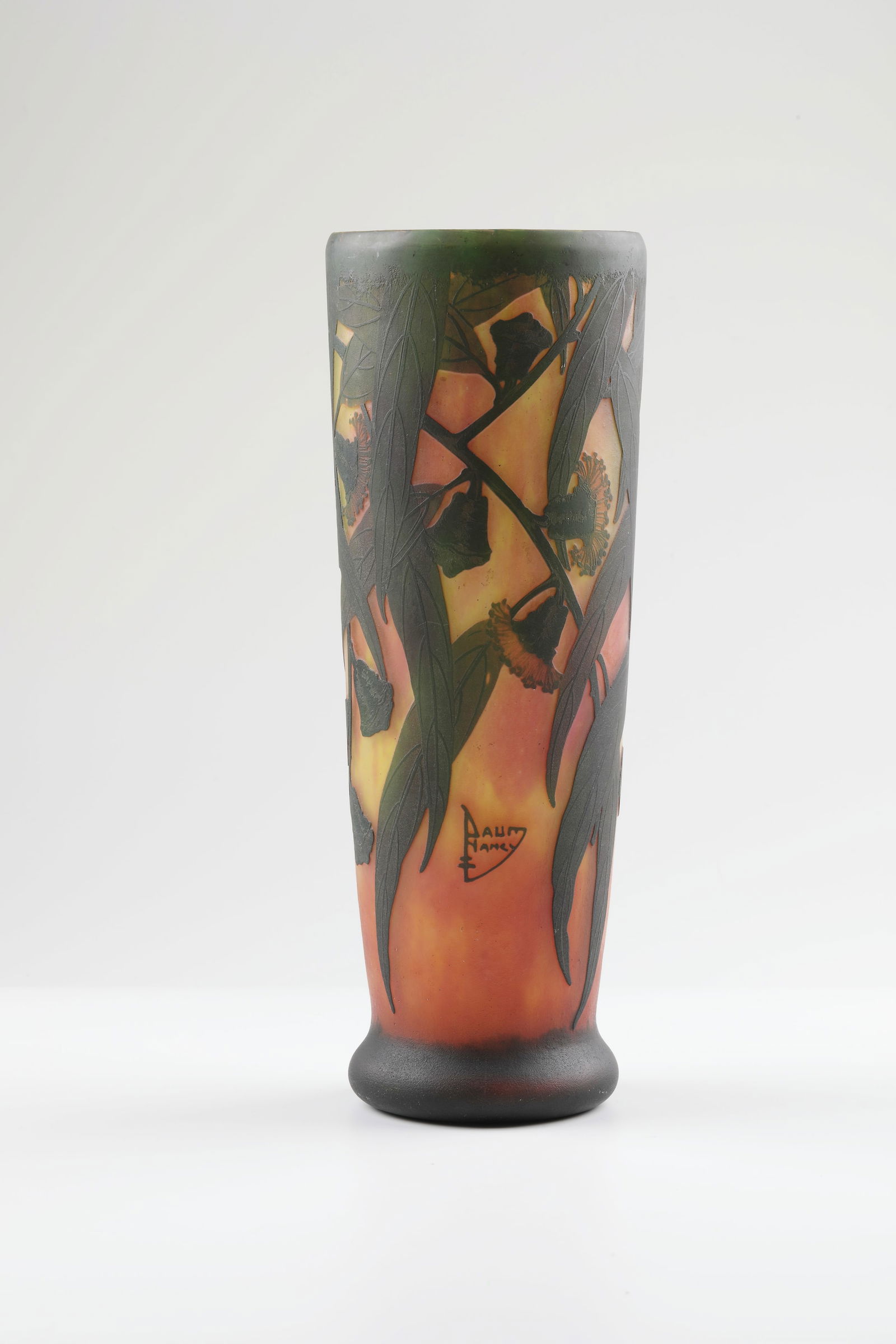 Vase ''Eucalyptus'': Vase ''Eucalyptus'' Daum Frères, Nancy, c. 1913 Colourless flashed glass with powder inclusions in yellow and orange as well as melting in dark green. Etched décor all around: eucalyptus branches wi