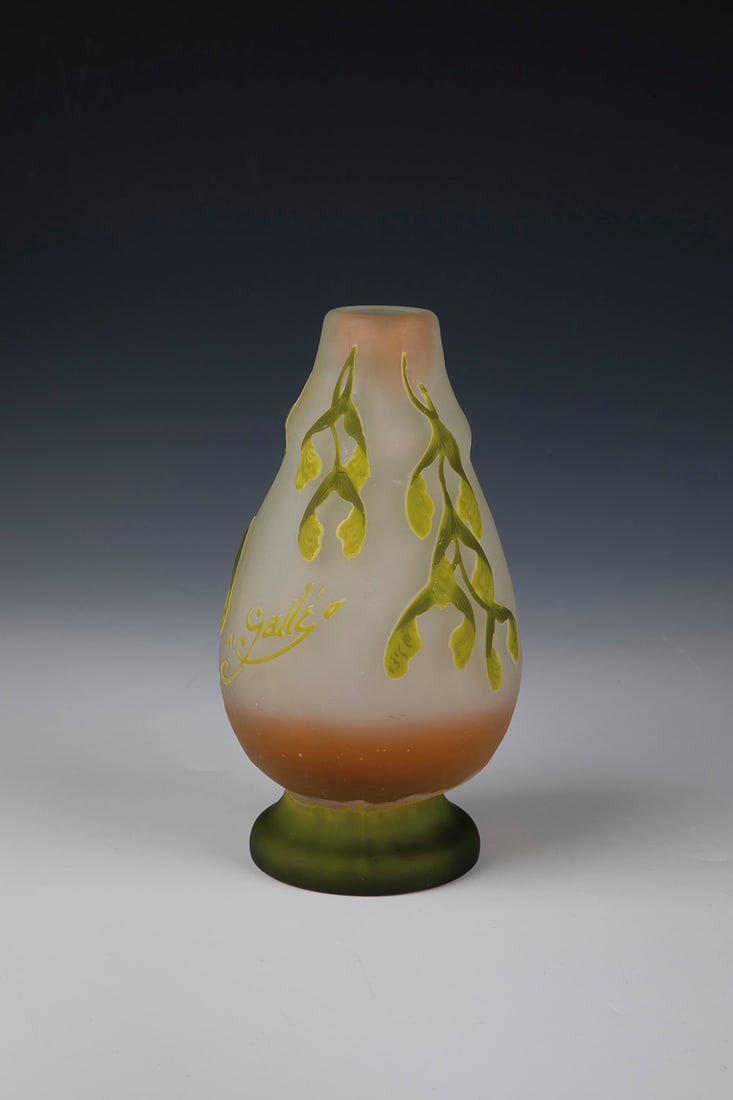Vase with ash maple: Vase with Ash Maple Emile Gallé, Nancy, c. 1905 Colourless glass with triple overlay in white, yellow and light green, with salmon-coloured partial underlay. Relief etched decoration: branch with