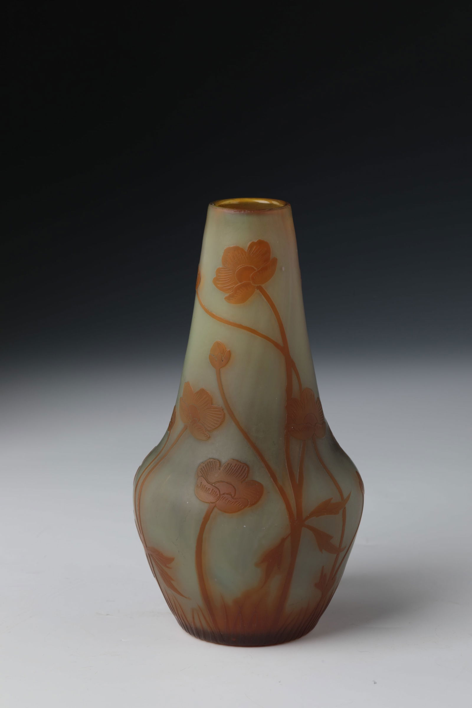 Vase with buttercup ''Les Boutons d'or'': Vase with buttercup ''Les Boutons d'or'' Cristallerie de Pantin, c. 1907 Colourless, green-underlaid glass, orange-brown overlay. Relief etched décor. Interior drawing in flat portrait and needle