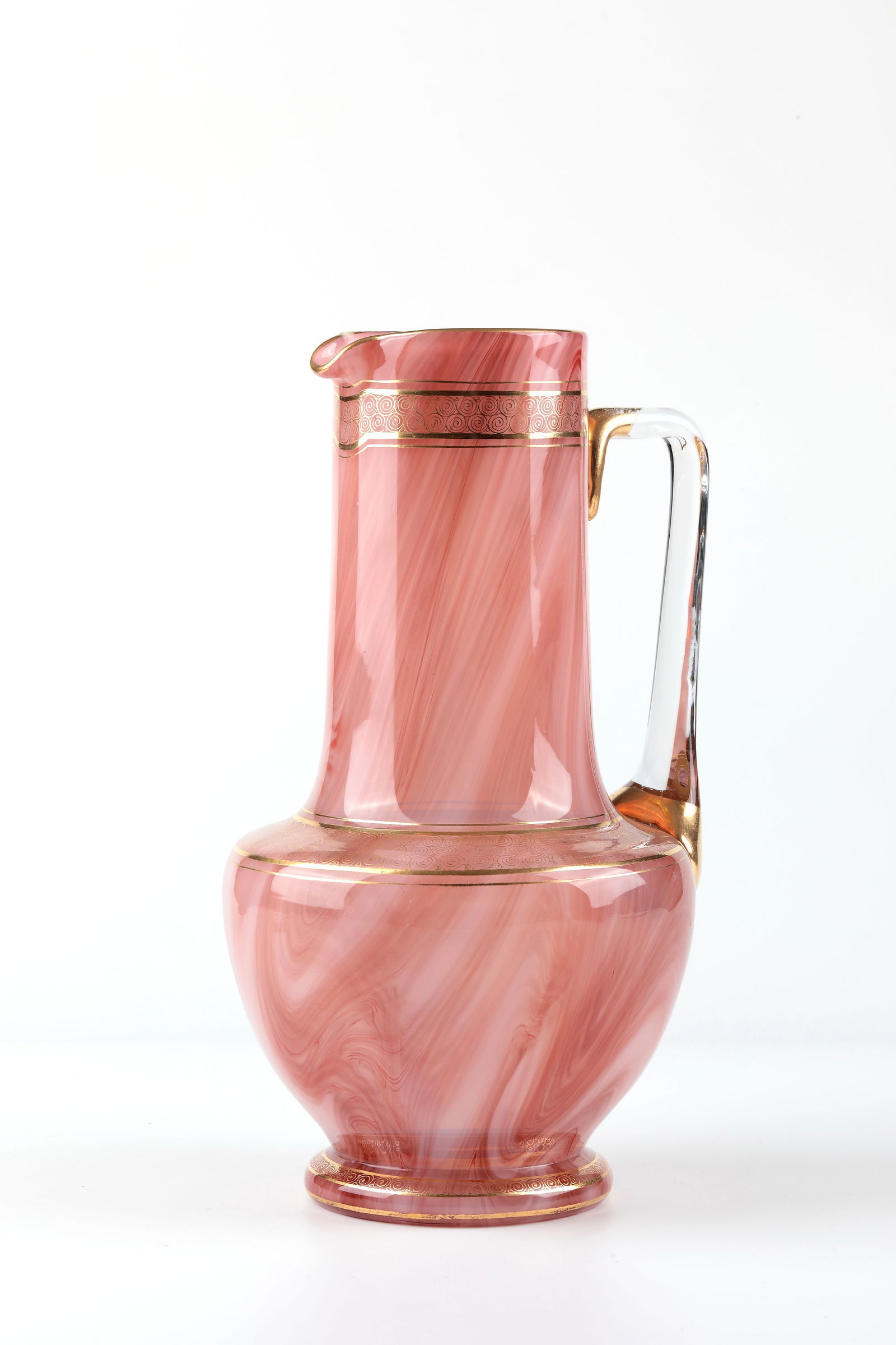 Jug ''Carnelian'': Tavern jug ''Carnelian'' Loetz Wwe., Klostermühle, 1888/89 Colourless glass, underlaid with white opal on the inside, the colourless top layer veined carmine red. Appliquéd handle. Ornamental gold