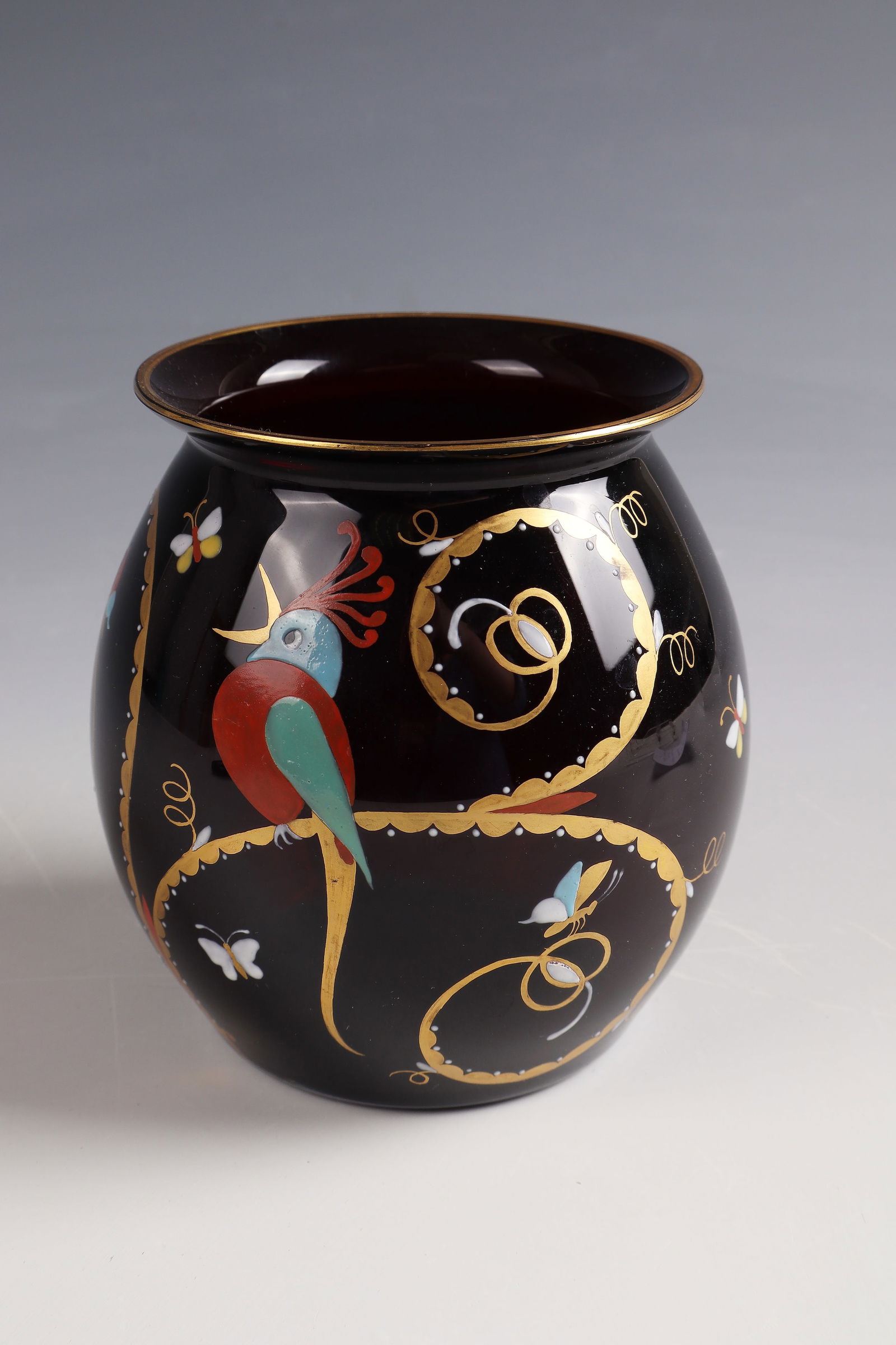 Vase with bird motif: Vase with bird motif Josephinenhütte, designed by Siegfried Haertel, c. 1921, gold ruby glass. Slightly hollow-ground back with artist's mark applied in gold. On the bulbous wall, stylized birds sit