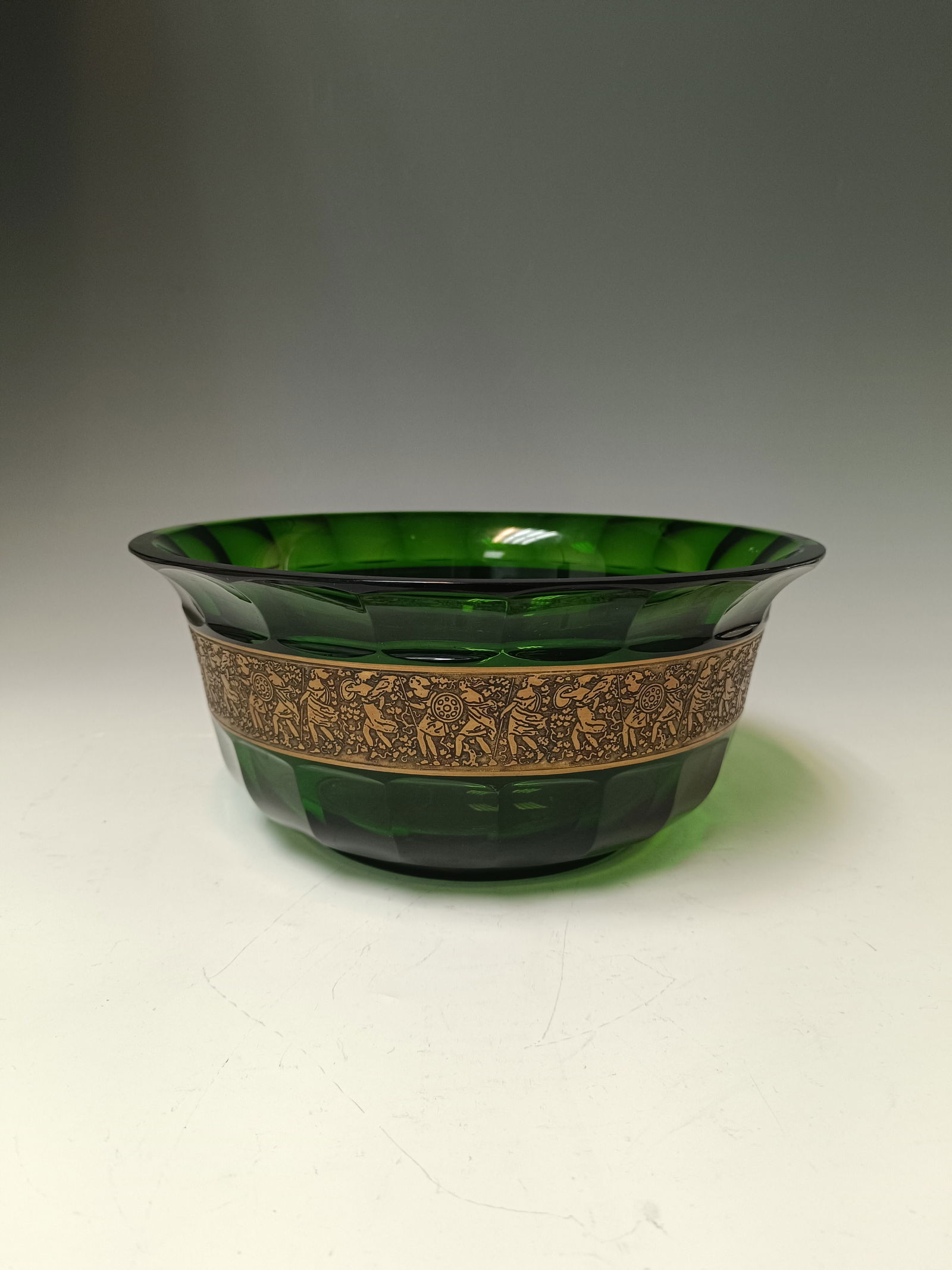 Bowl with Amazons: Bowl with Amazonen Moser, Karlsbad, c. 1920 Green glass, with peel cut, etched, gilded and brown patinated Amazon frieze. Underside in needle etching inscribed: made in Czecho Slovakia moser Karlsbad.