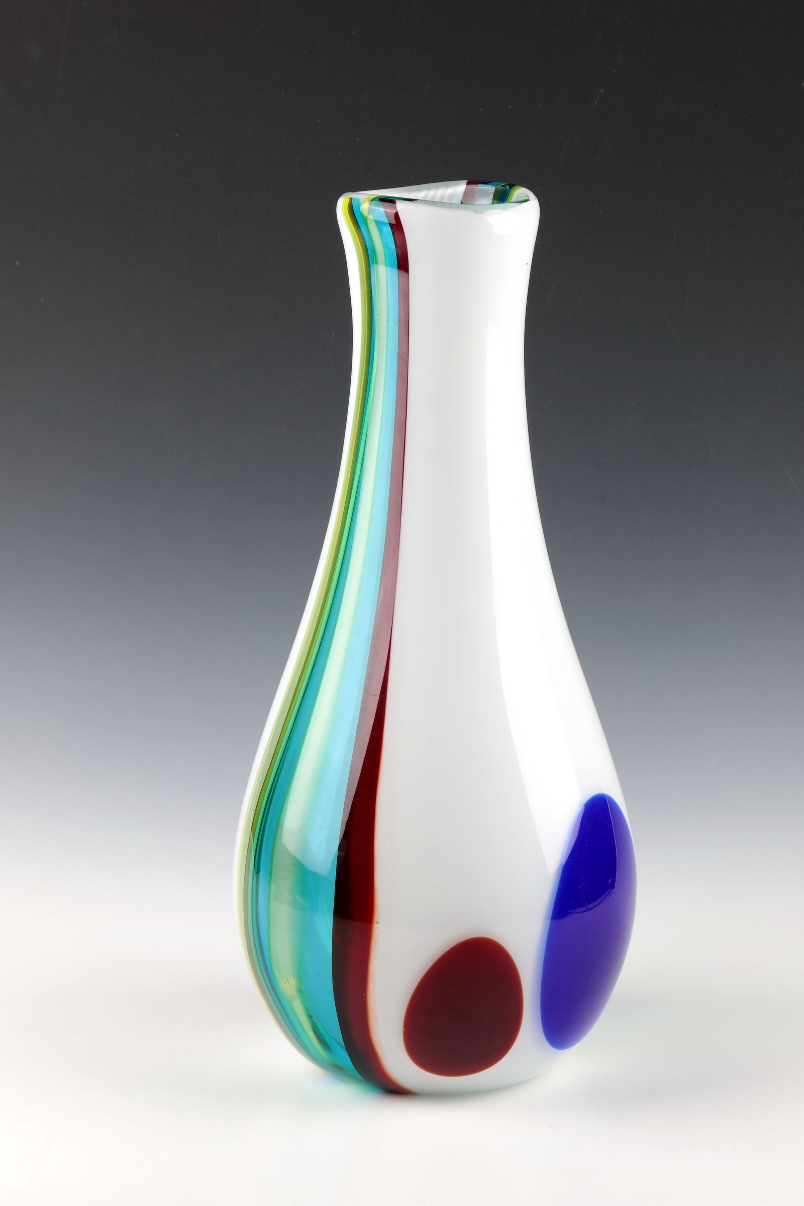 Vase ''a canne Macchiato'': Vase ''a canne Macchiato'' Anzolo Fuga (design), Arte Vetreria Muranese (A.Ve.M.), Murano, 1956 Colourless glass, with melted glass rods in Lattimo, violet, blue, light blue, yellow and green. Two lar