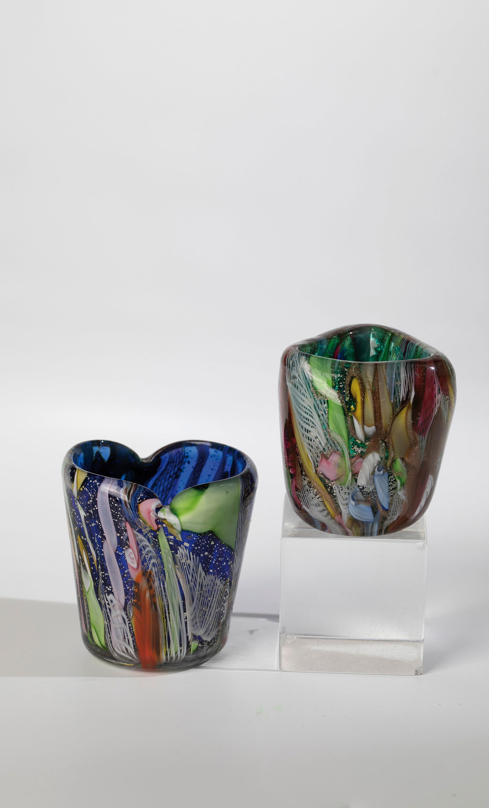 Two vases ''Bizantino'': Two vases ''Bizantino'' Arte Vetreria Muranese (A.Ve.M.), Murano, 1953 Thick-walled, blue or light green glass with colourless overlay. In several layers, area-filling decoration made of alternating