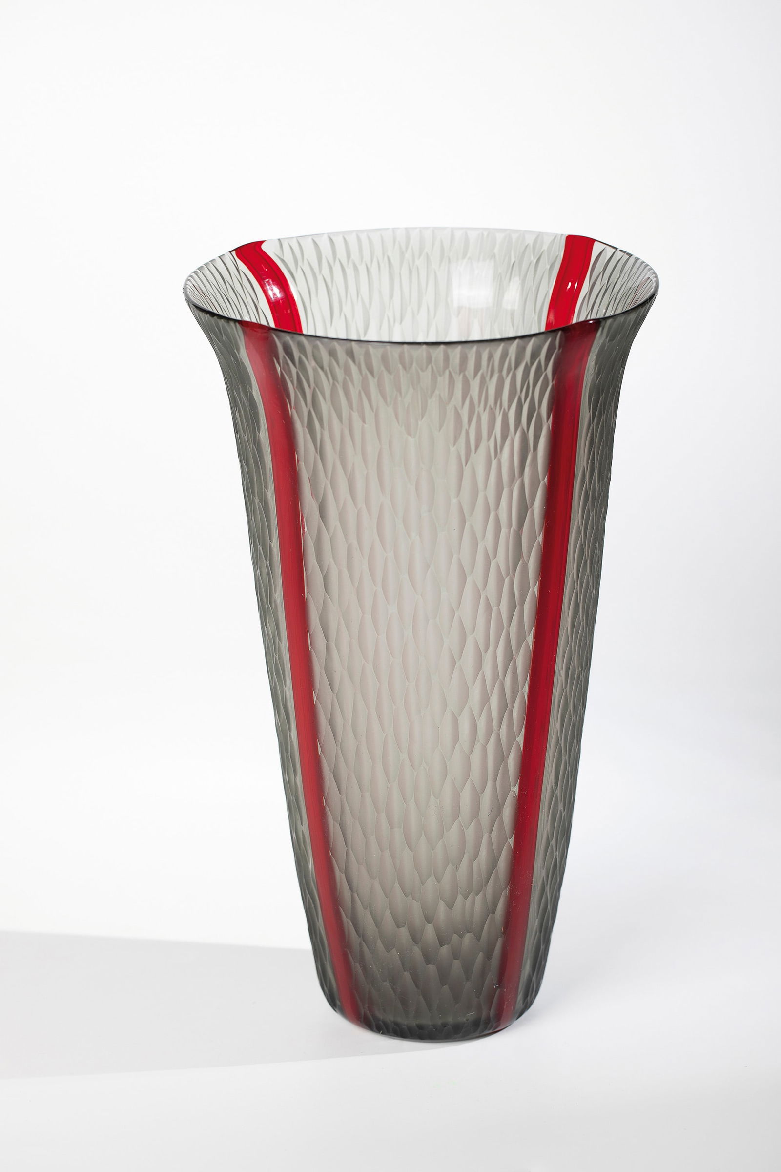 Vase ''Grigio a quattro canne rubino'': Vase ''Grigio a quattro canne rubino'' Barbini, Murano 2nd half of the 20th century Smoky grey glass with vertically melted bands in ruby red. Surface processed using grinding technique. matted. H.