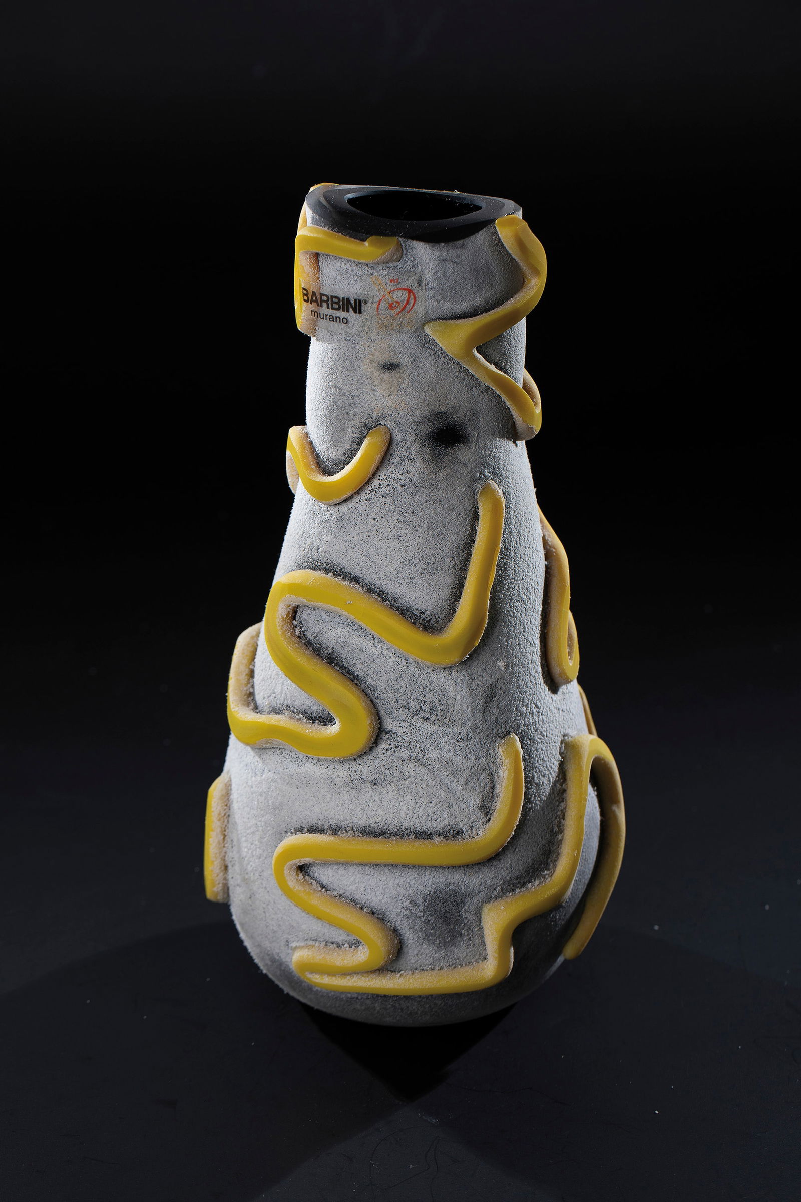 Vase ''Scavo'': Vase ''Scavo'' Barbini, Murano, after 2002 opaque black glass, colourless overlay. The outer wall is processed using the Scavo technique. Abstracted decoration of opaque yellow glass bands fused all