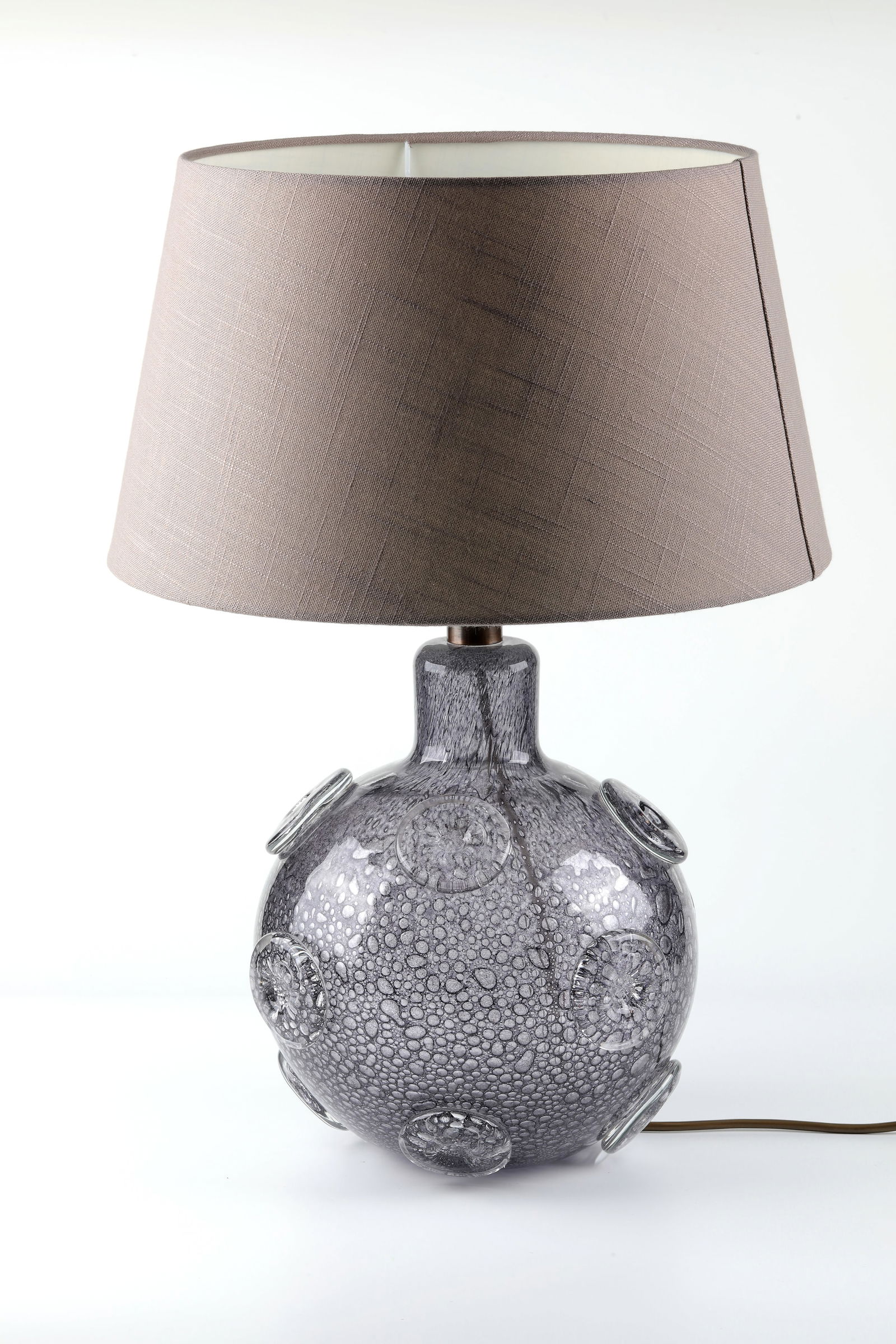 Table Lamp ''Efeso'': Table lamp ''Efeso'' Ercole Barovier (design), Barovier & Toso, Murano, 1964 Colourless, strongly bubbled glass with fine, grey-purple powder melting between the layers. On the wall in three rows