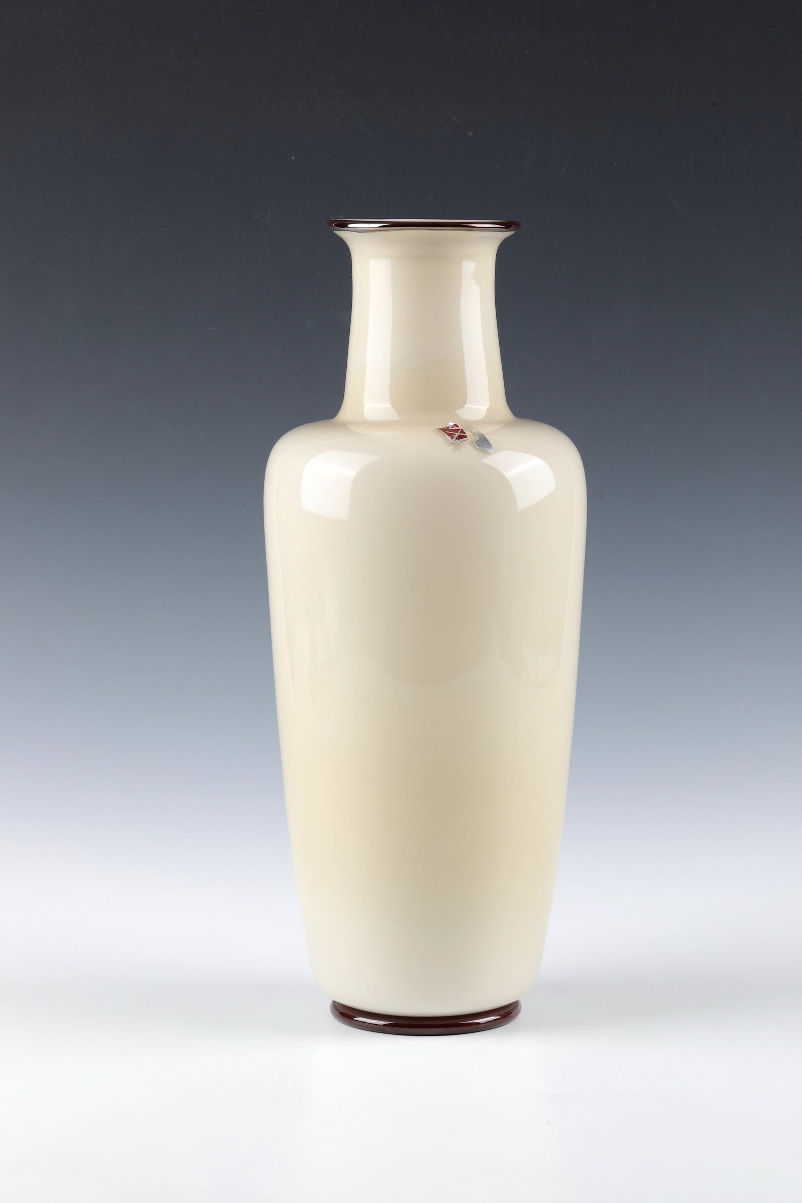 Vase: Vase Barovier & Toso, Murano, circa 1975 Opakes, light beige glass. The attached, round stand and band of reddish-brown glass applied to the edge of the mouth. Remnants original manufacturer's label.