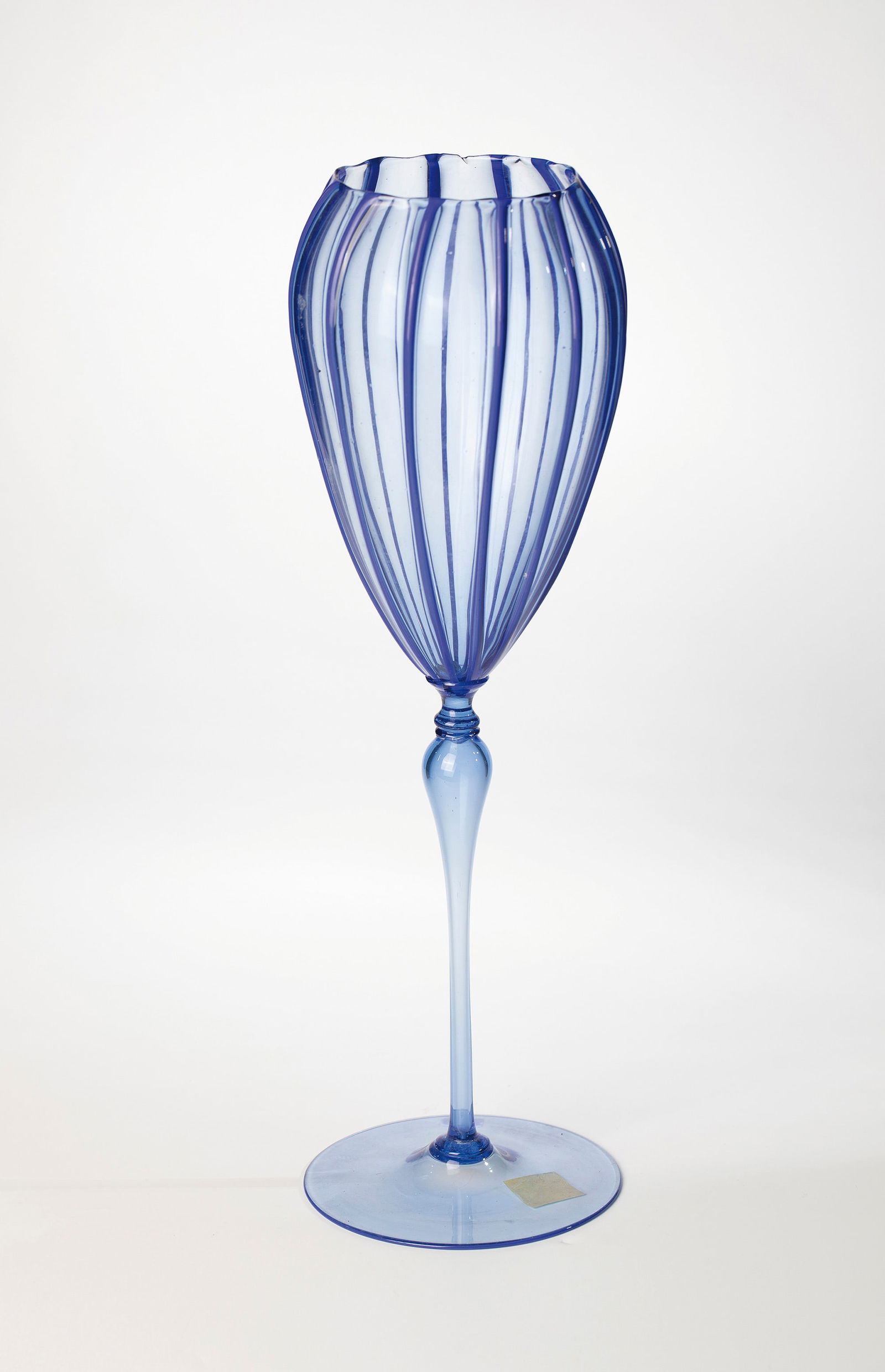 Large cup vase: Large cup vase Compagnia di Venezia e Murano - Pauly & C., Murano, c. 1925 Hollow baluster shaft and disc base made of thin-walled, light blue glass. The cuppa with melted, dark blue glass rods. Under