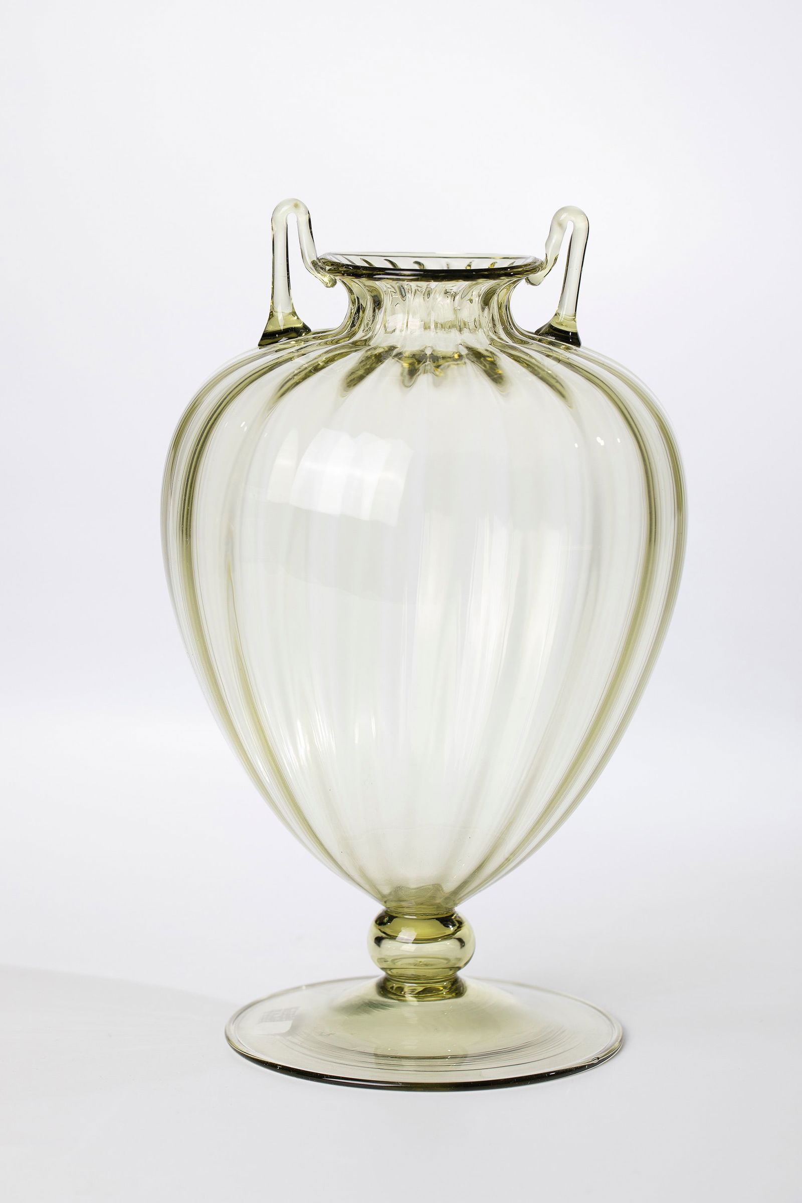Baluster vase with handle ''Soffiato'': Baluster vase with handle ''Soffiato'' Vittorio Zecchin (design), Compagnia di Venezia e Murano - Pauly & C., ca. 1920-30 Light yellow, ribbed blown glass. Freely attached handles. Underside with orig