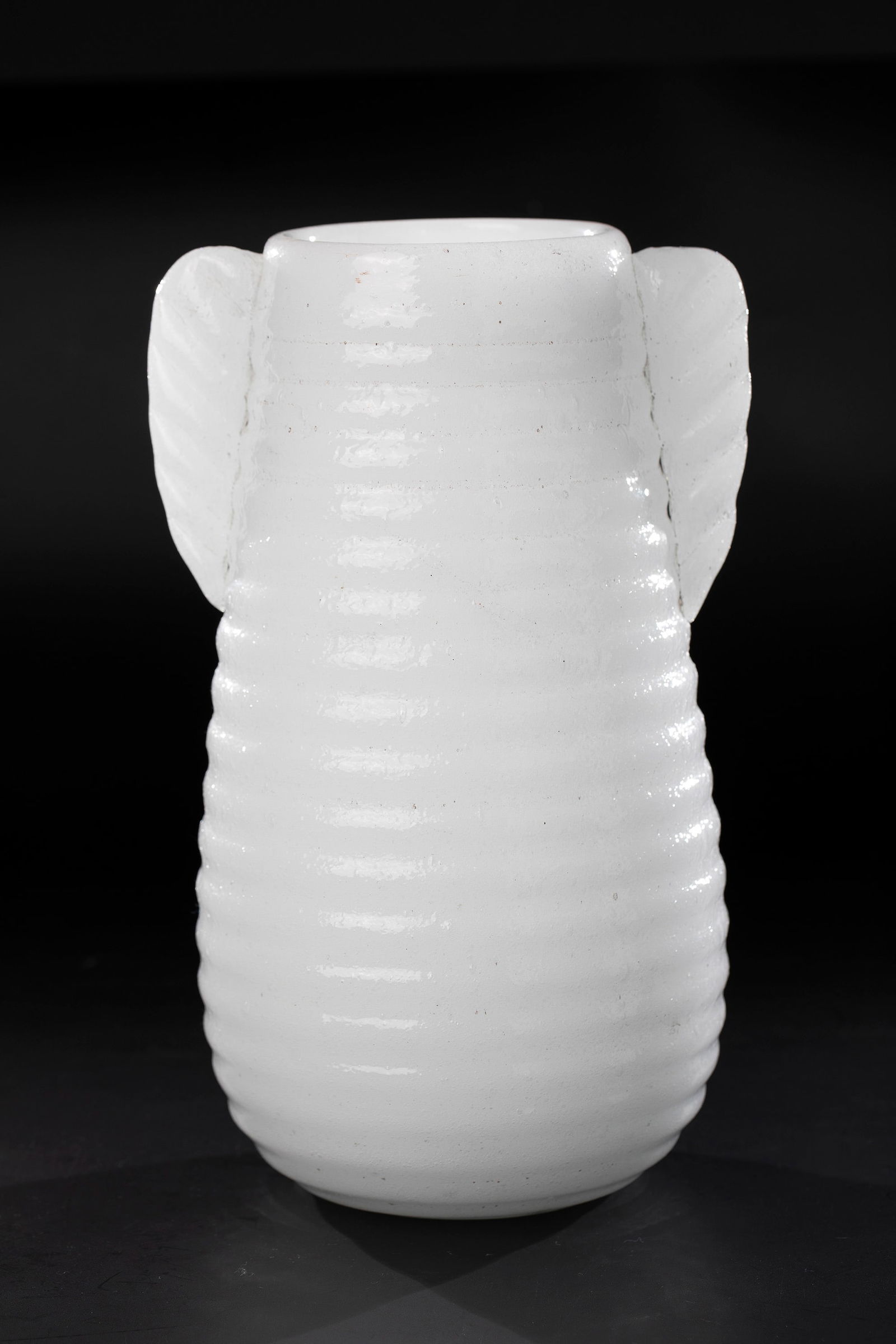 Vase ''Pulegoso'': Vase ''Pulegoso'' Fratelli Toso, Murano, 1933-1935 'Lattimo' glass, colourless overlay. Strongly blistered ('Pulegoso'). Horizontally ribbed wall, blown into the mold. Handles freely applied on both s