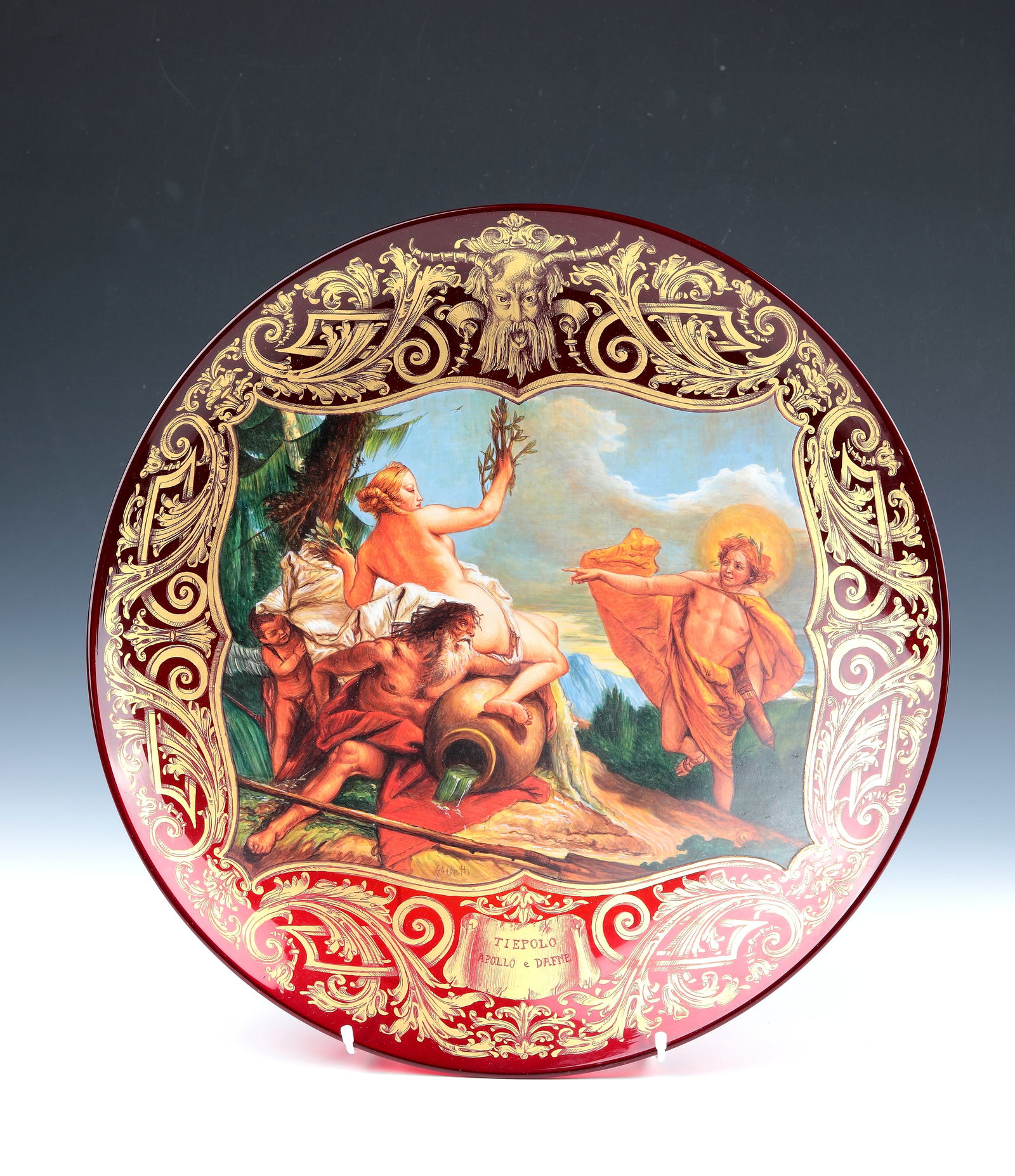 Plate with Mythological Scene ''Apollo and Daphne'': Plate with mythological scene ''Apollo and Daphne'' Murano, late 20th century Ruby red glass with finely executed polychrome depiction in the mirror: Apollo and Daphne (after a painting by Giovanni
