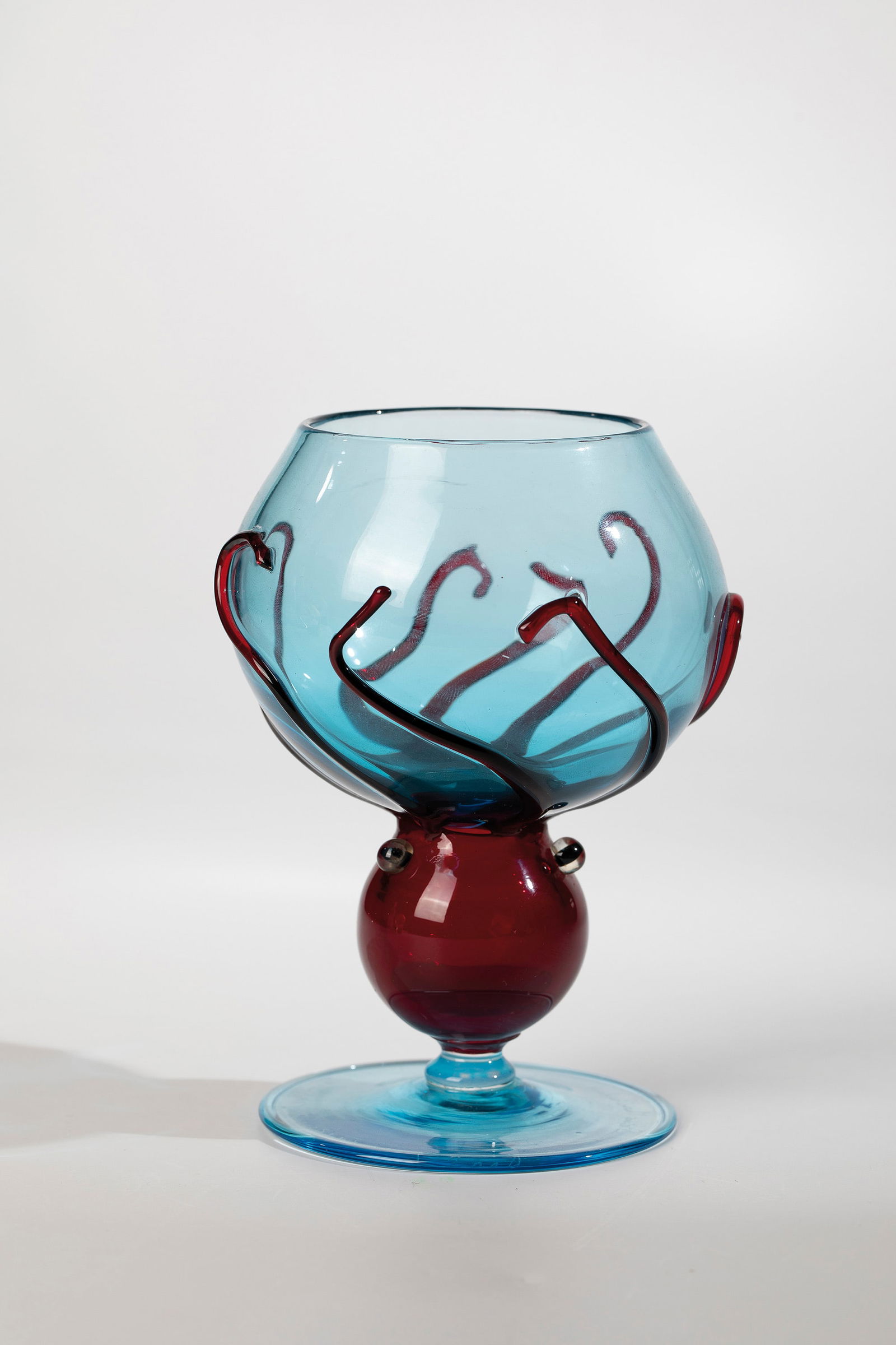 Drinking glass ''Mescavolim'': Drinking glass ''Mescavolim'' Stefano Mattiello/Massimo Nordio, Murano, 2008/2009 Light blue, ruby red and colourless glass. Freely formed and fused together. Engraved underside: Stefano Mattiello