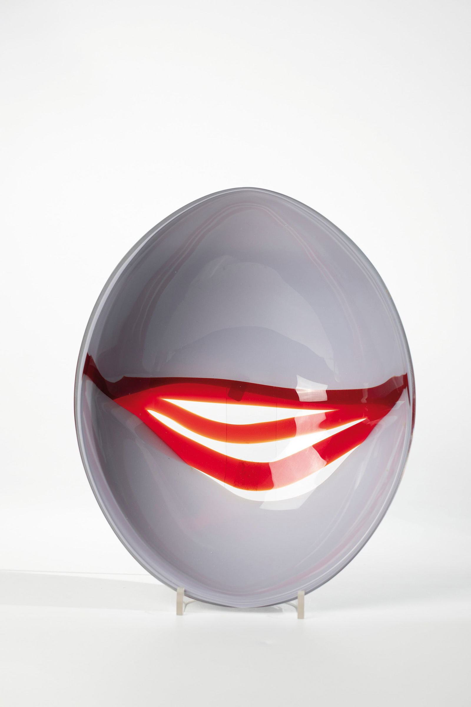 Shell: Bowl Seguso Vetri d'Arte, Murano, 2nd half of the 20th century Colourless glass, partially underlaid in grey opal with melted glass band as an interlayer decoration of ruby red glass. Colorless