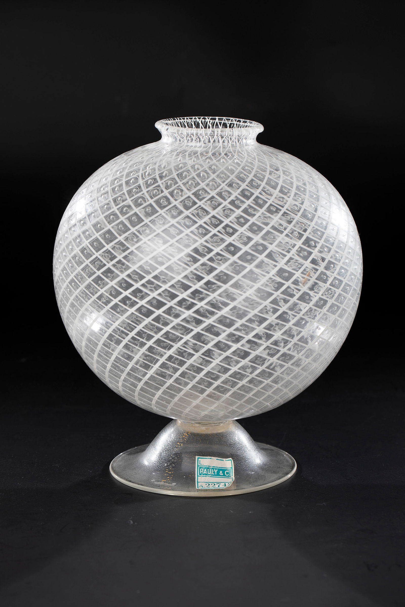 Vase ''Reticello'': Vase ''Reticello'' Venini & C. for Pauly & C., Murano, circa 1930 Spherical, colourless glass with net-like decoration ('Reticello') in opaque white and incorporated air bubbles. Attached colourless b