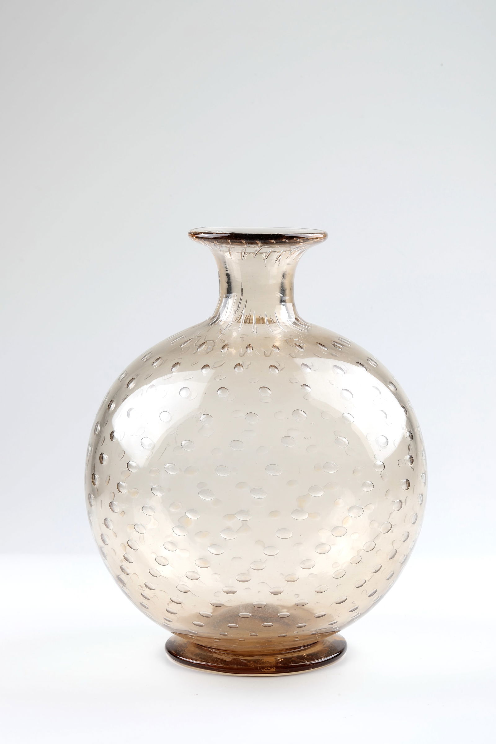 Vase ''a Bolle'': Vase ''a Bolle'' Venini, Murano, c. 1950 Colourless glass, light brown underlaid with air bubbles incorporated in several rows. Inscribed on the bottom: venini murano ITALIA (3-line etching stamp). H.