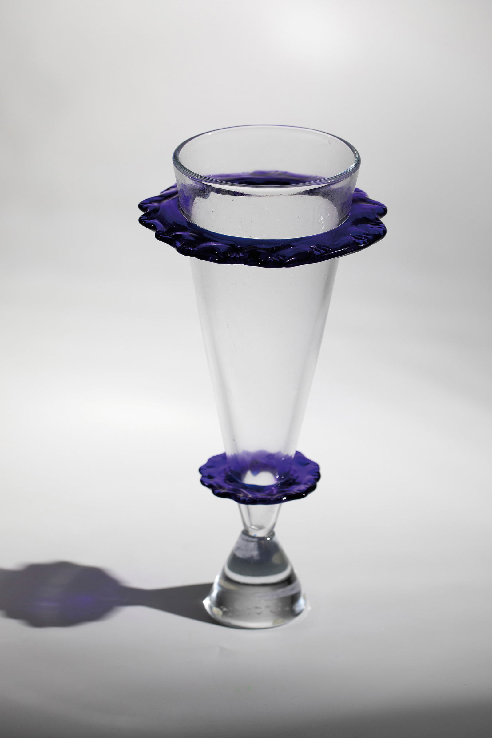 Vase object: Vase object Ugo La Pietra (design), Vetreria Vistosi, Murano, 1970s Colorless glass. Applications made of blue glass pinched with pliers. Freely attached, tapering conically upwards. Engraved