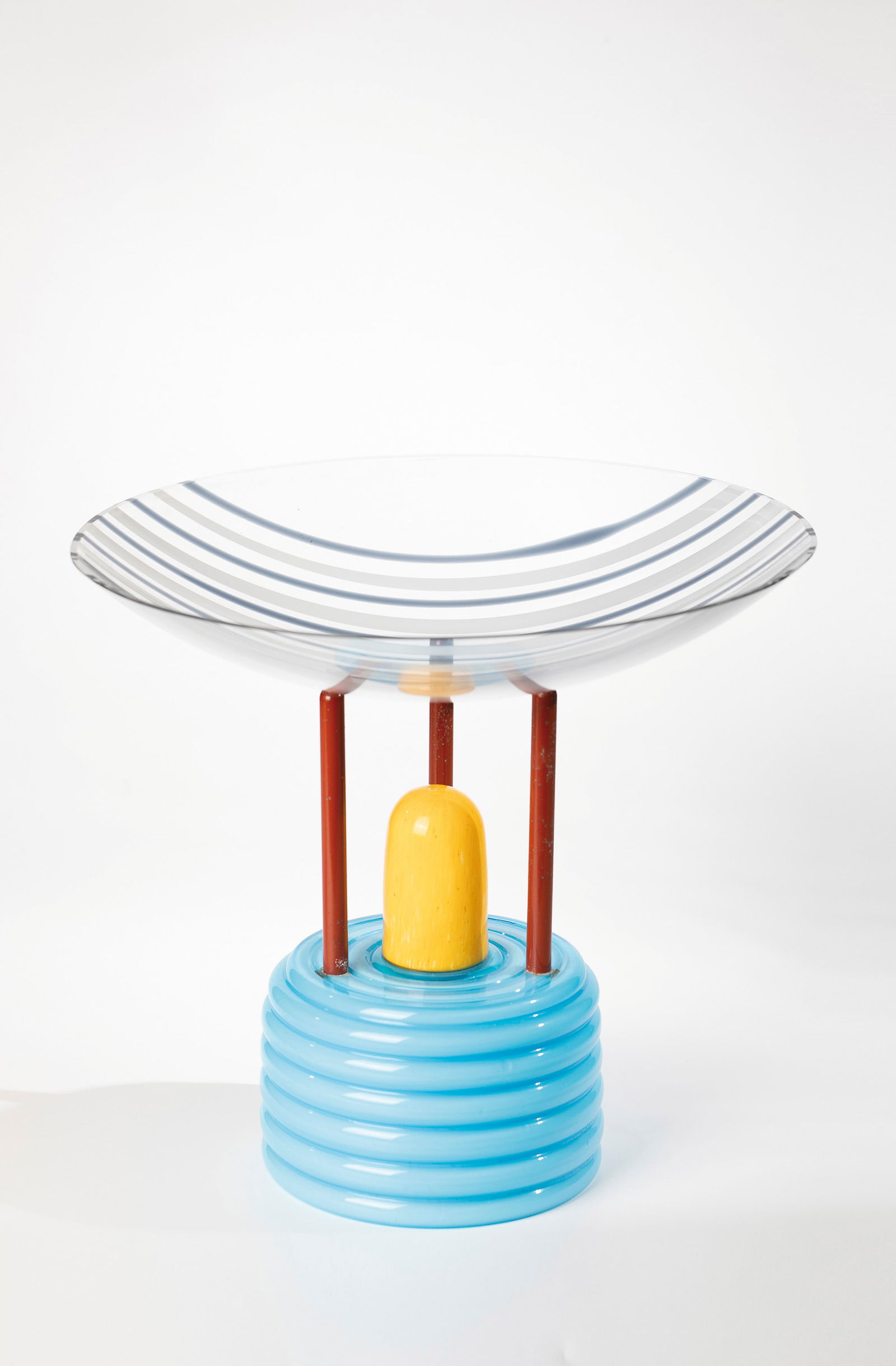 Shell Object: Bowl object Peter Shire (design), Vistosi, Murano, 1980s Colorless glass with blue-black and opaque white band inclusions. Light blue glass underlaid with white opal and with sunny yellow powder