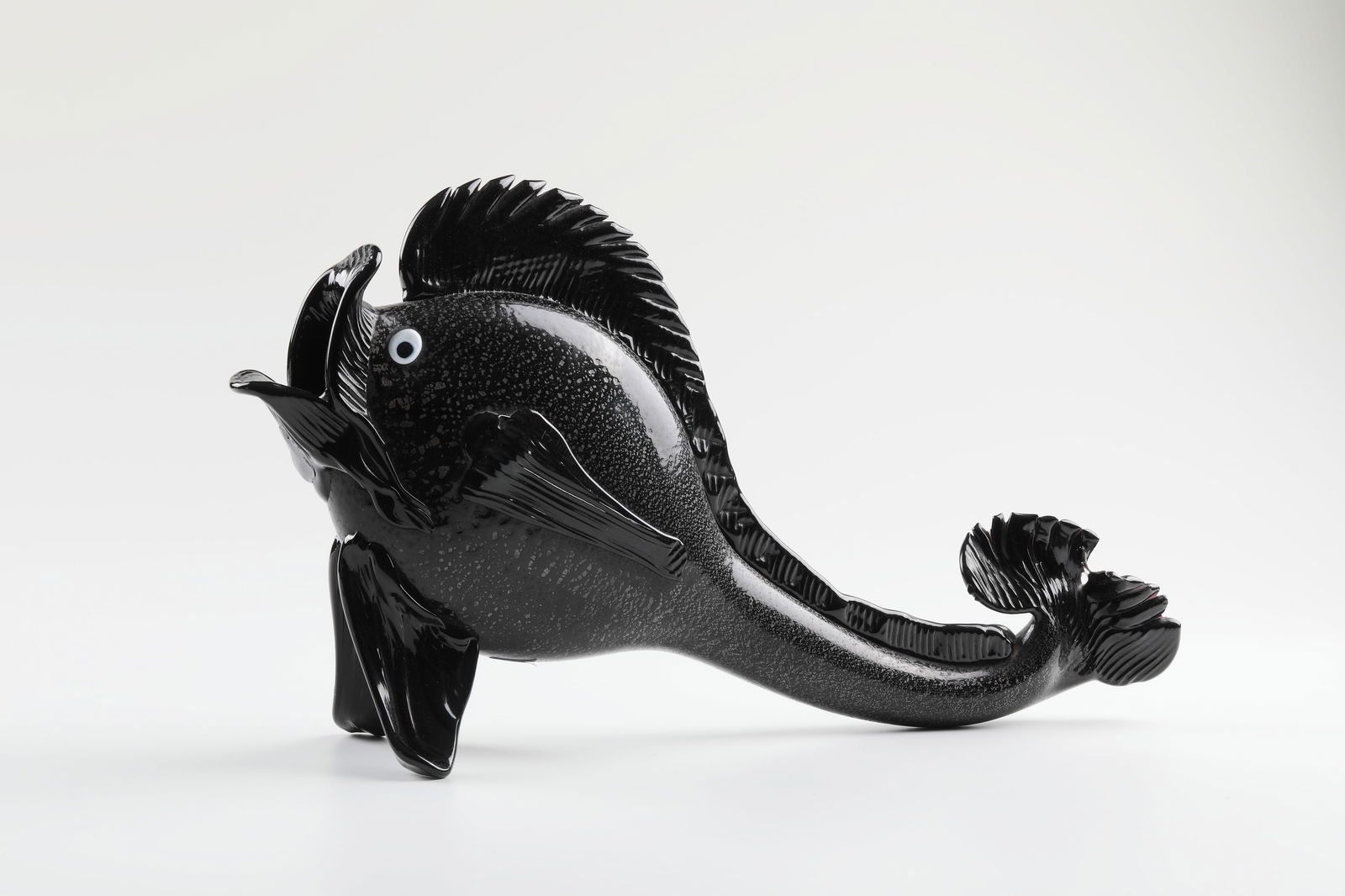 Animal Figurine ''Pesce'': Animal Figurine ''Pesce'' Nason & Maschio, Murano, ca. 1931-1934 Thin-walled, black-violet glass with oxidized silver foil inclusions. Appliquéd eyes made of opaque white and black glass, freely