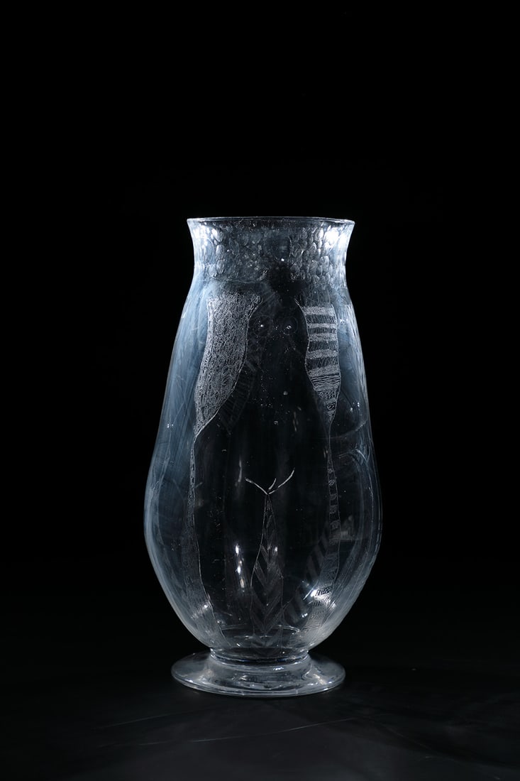 Vase: Vase Erik Höglund (design), Kosta, c. 1956 Colourless glass, mould-blown. Wall and disc base with abstract decoration executed in vibro-engraving. Below the edge of the muzzle there are several rows