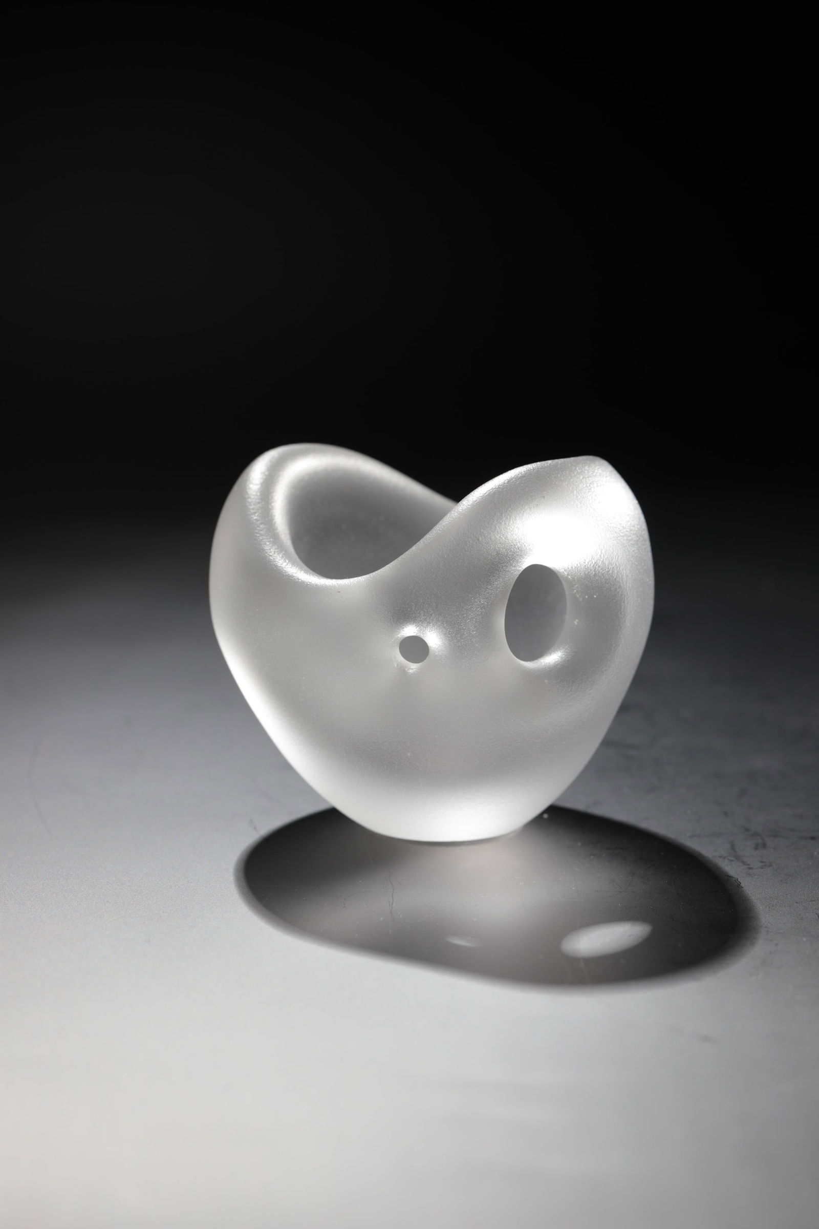 Bowl ''Kantarelli'': Bowl ''Kantarelli'' Timo Sarpaneva (design), IIttala, 1951 Colourless glass, blown into the mould, sandblasted and acid-polished. Signed in diamond crack: TIMO SARPANEVA - IITTALA. H. 7.5 cm. Lit.: