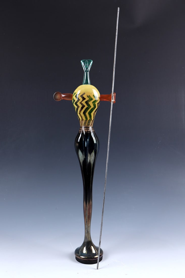 ''Warrior'': ''Warrior'' Kjell Engman, 1993 Colourless glass with multi-coloured powder coating and melting, partly freely formed or moulded, acid-matted and polished, melted together. Engraving decoration rubbed