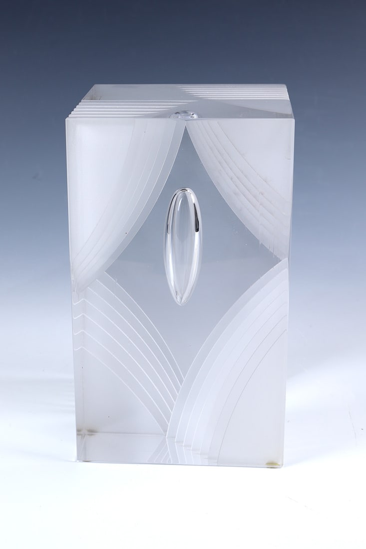 Object, Studio Glashyttan Ahus, 1993: Object Studio Glashyttan Ahus, 1993 Colourless glass block, large pierced air bubble, sawn, ground, polished and acid matted. Engraved in: STUDIO AHUS SWEDEN 1993 CHZ N° 14/25. 21.7 x 12 x 12.5 cm.