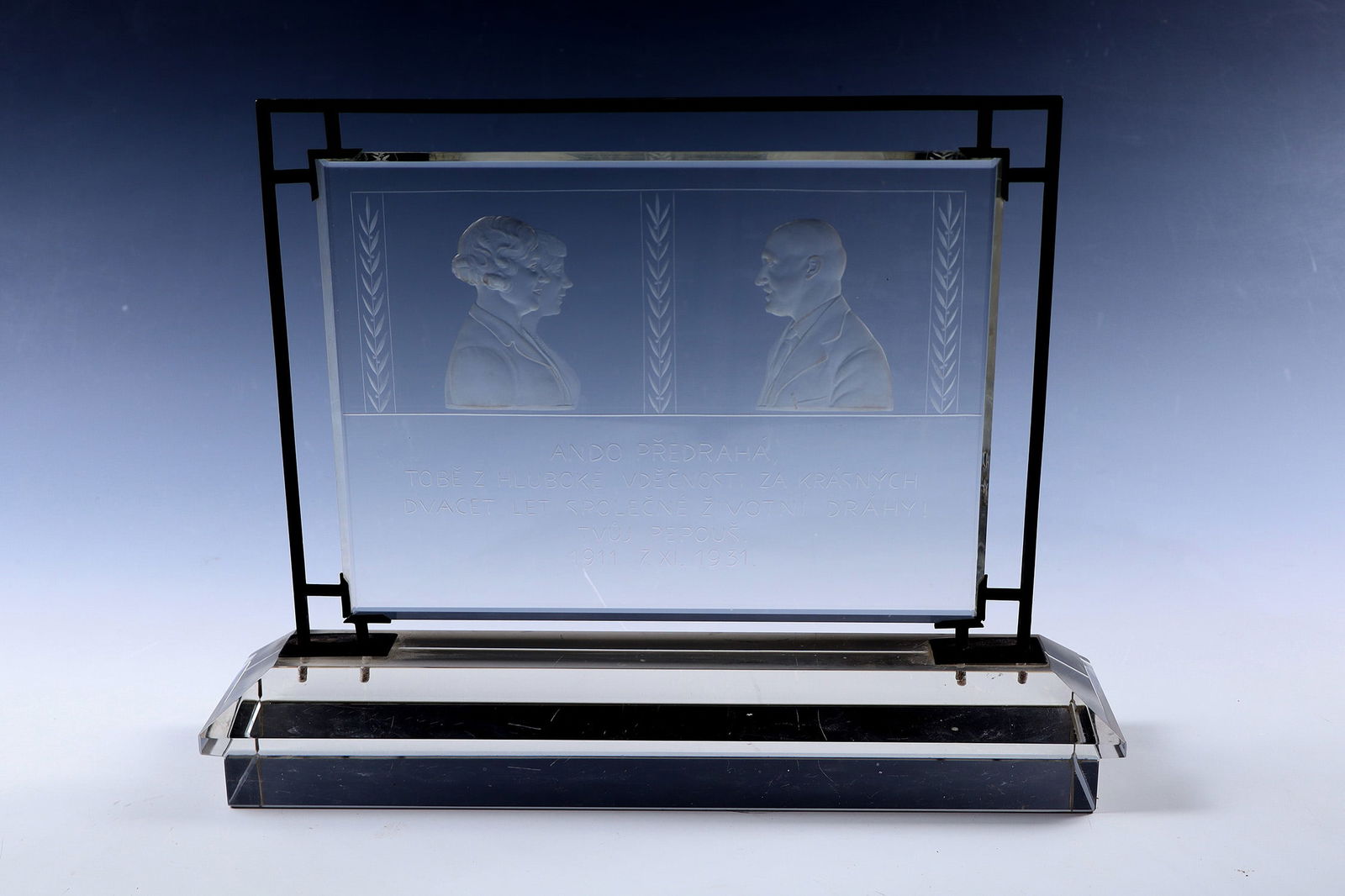 Rare, Signed Portrait Plaque: Rare, signed portrait plaque Josef Drahonovsky, Prague, 1931 Metal-framed glass plate with two female profile portraits to the right, opposite a gentleman in profile to the left, as well as laurel