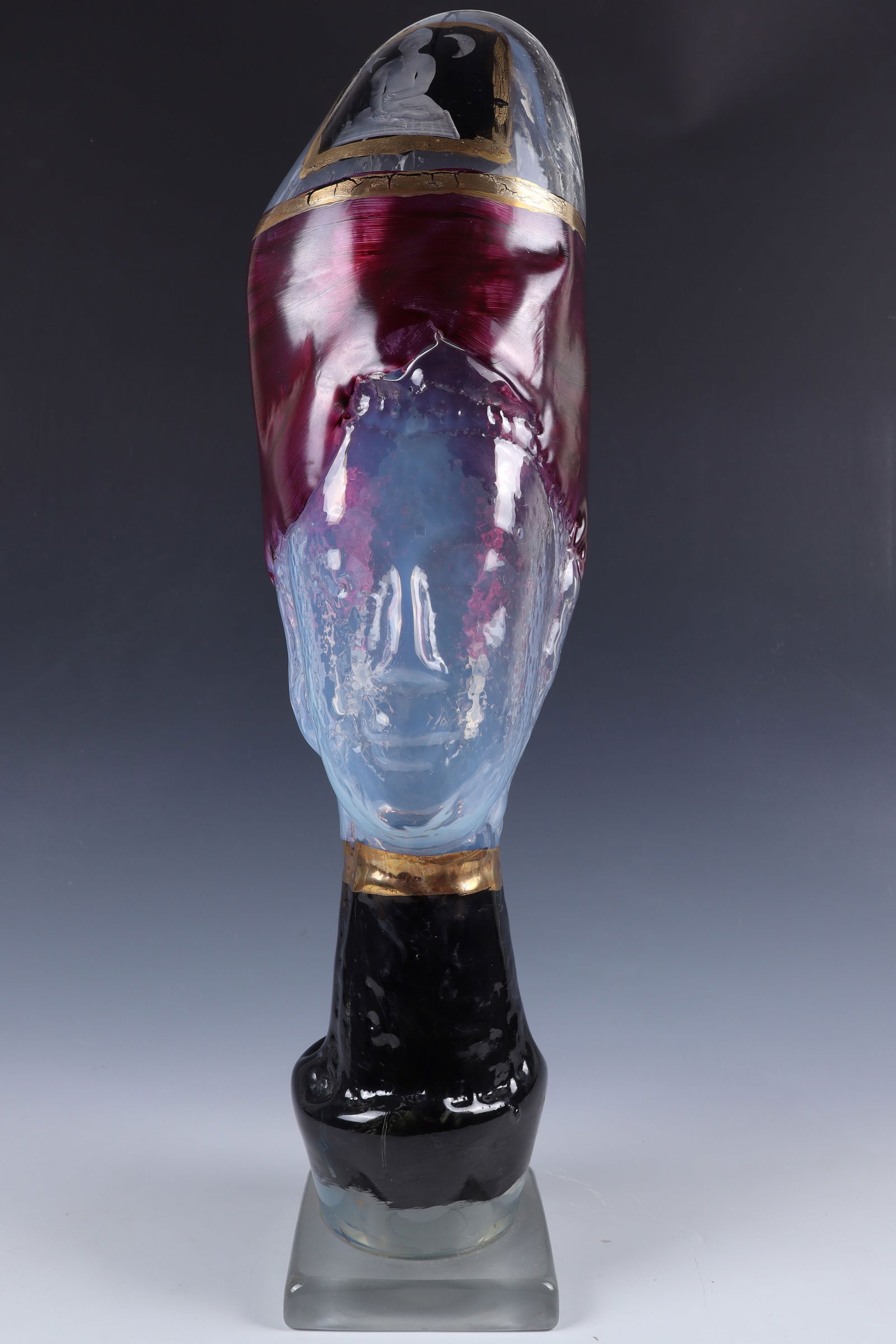 ''Buddha'': ''Buddha'' Erwin Eisch, c. 1988 Colourless glass, partially underlaid with gradient opal, modell-blown, engraved, decorated with enamel and gold painting. Base top matted. H. 66 cm. Lit.: K.