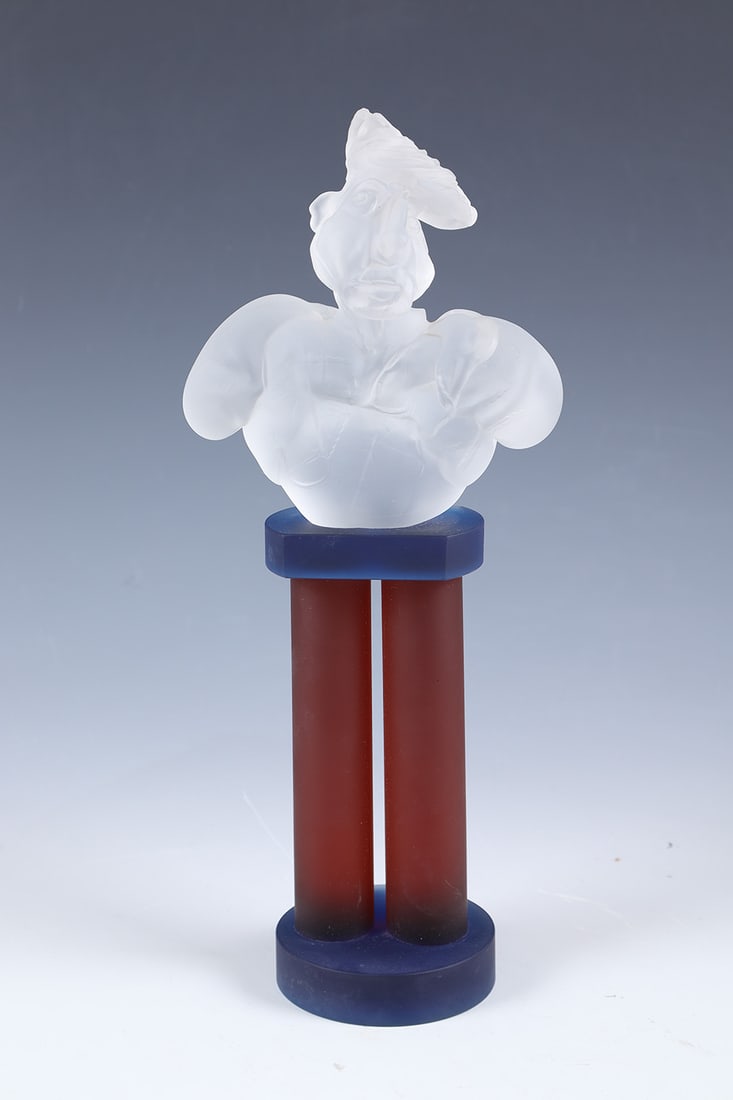 Cartoon Bust: Caricature Bust Glass Studio Borowski Colourless, blue and violet glass, moulded, cut, acid frosted and glued. Engraved in: GLASSTUDIO BOROWSKI. H. 31 cm