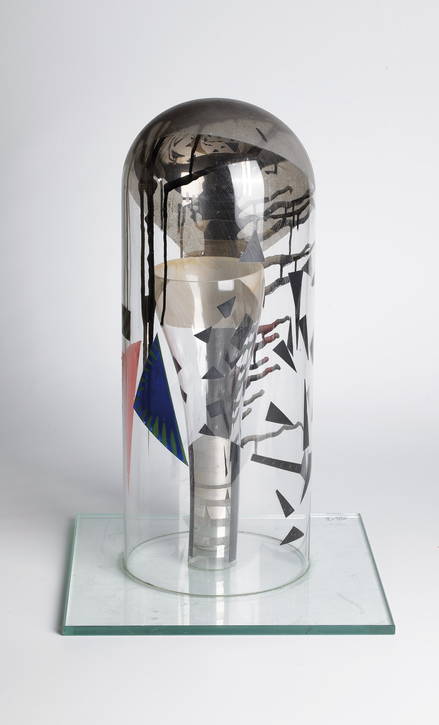 Object: Object 20th Century Colorless Glass. Abstract multi-coloured décor executed with enamel paint. Glued. H. 46.5 cm.