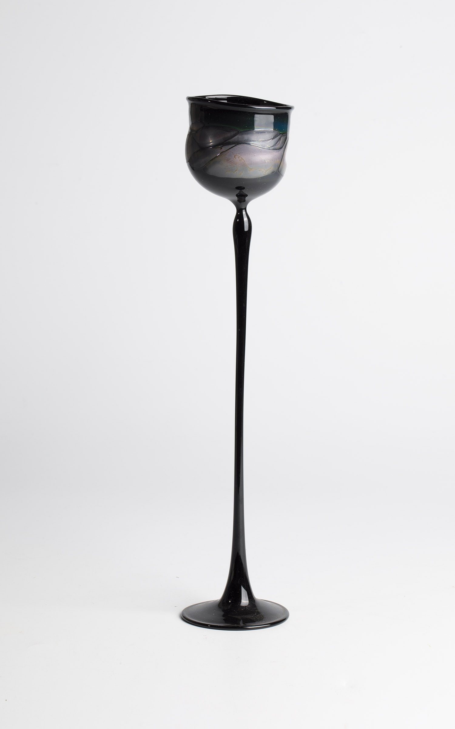 Stem jar: Stem glass Lubomir Hora, 1980 Dark violet glass blown in front of the lamp with coloured melting. Signed and dated ''Hora '80''. H. 33 cm.