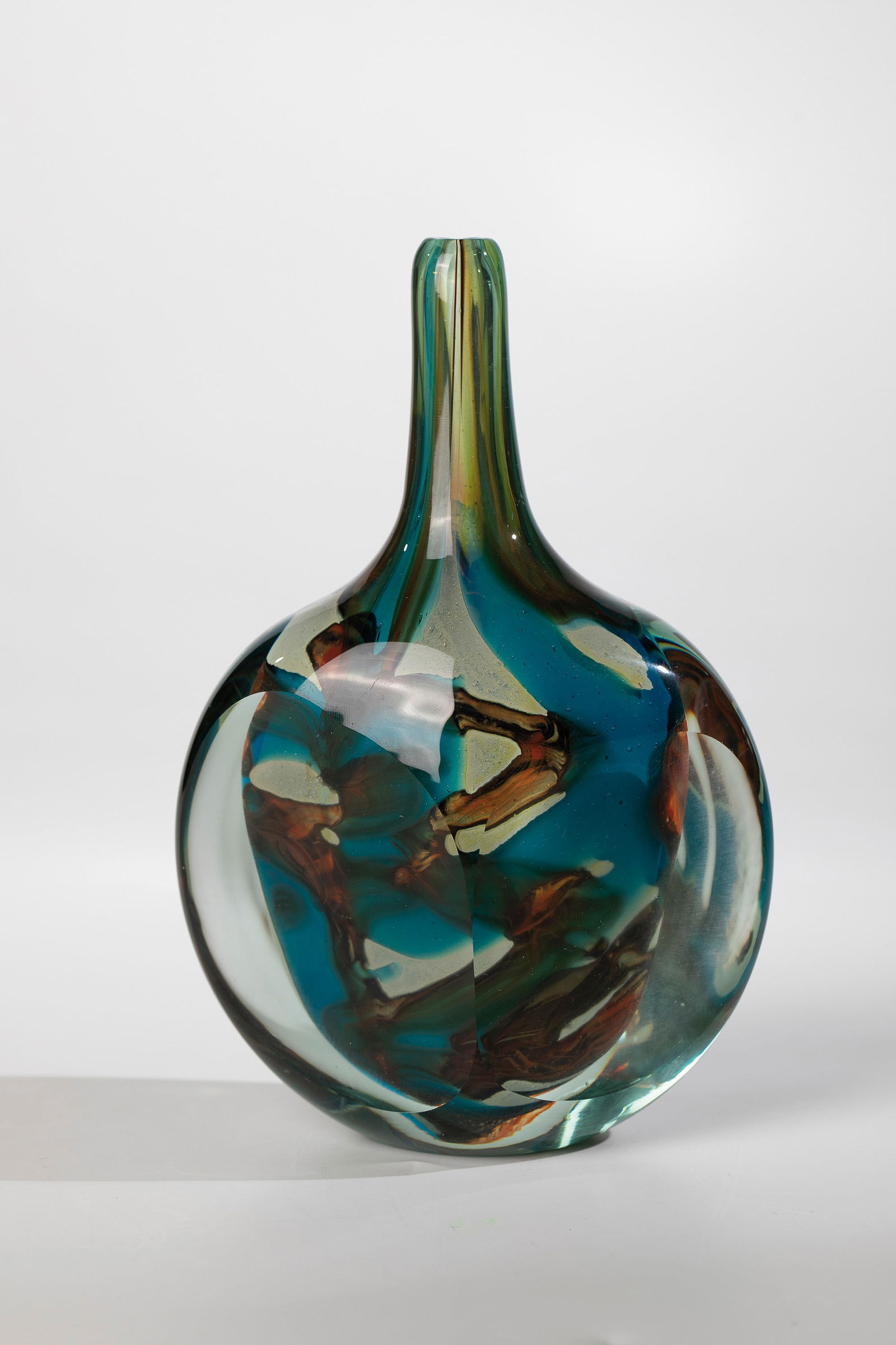 Bottle Vase ''Tiger'': Bottle Vase ''Tiger'' Eric Dobson (Design Attributed), Mdina Glass, Malta, 1970s Thick-walled, colourless glass, multi-coloured underlay. Partly ground and polished. H. 19 cm. Please note that items