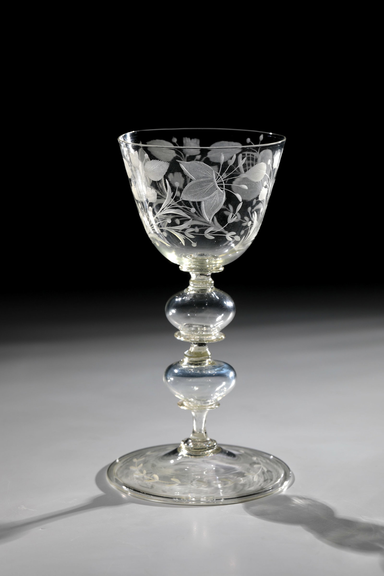 Hollow baluster goblet: Hollow baluster goblet Nuremberg, E. 17th century Engraved wreath of leaves on the rising base of the disc with the edge turned downwards. Articulated shaft consisting of two hollow nodi and ring