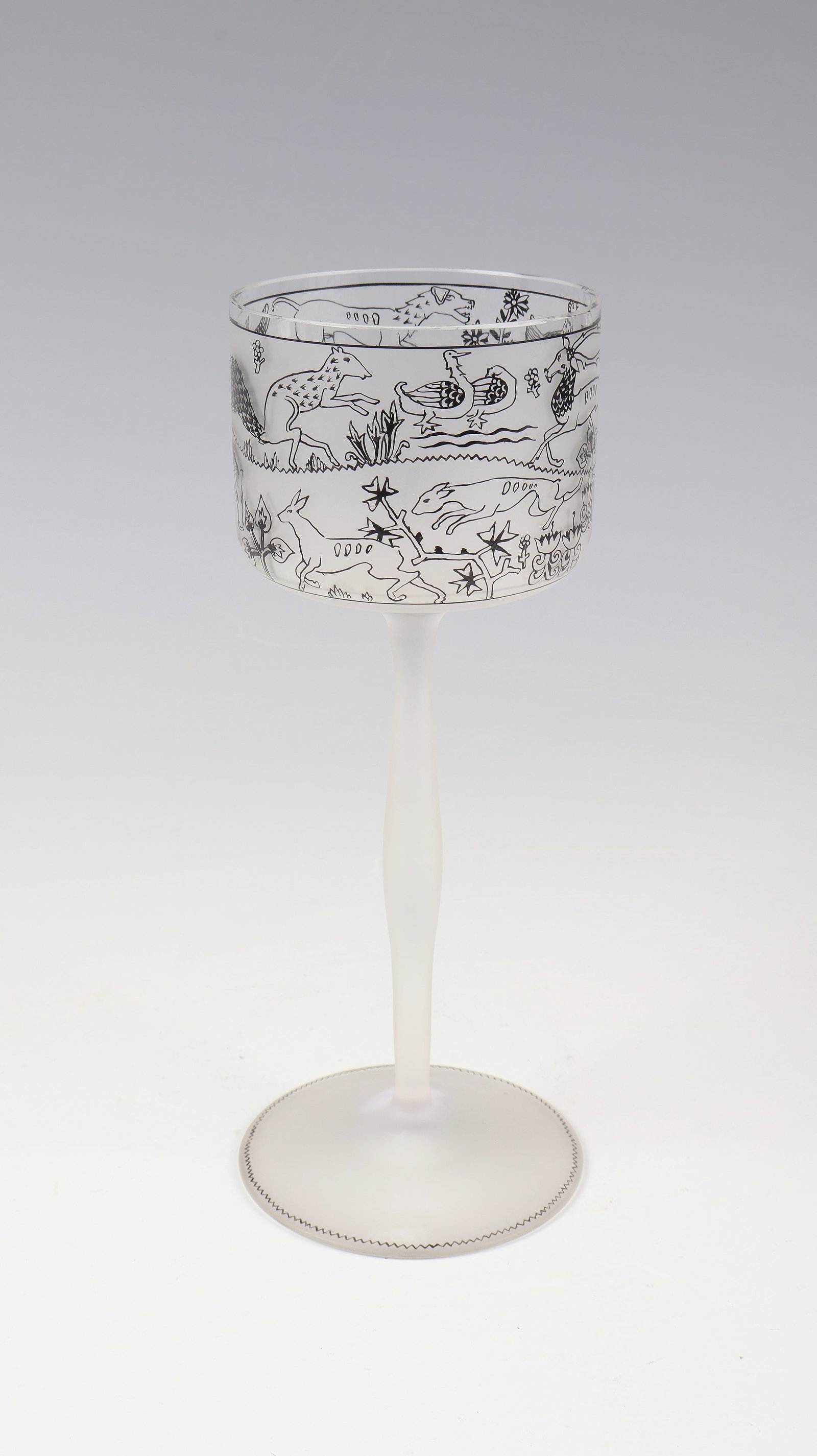 Rare Wine Glass with Animal Frieze: Rare wine glass with animal frieze Ludwig Heinrich Jungnickel (form), Carl or Paul Thomas (design) for J. & L. Lobmeyr, Vienna before 1914 Colourless, semi-gloss etched glass with fine black solder pa