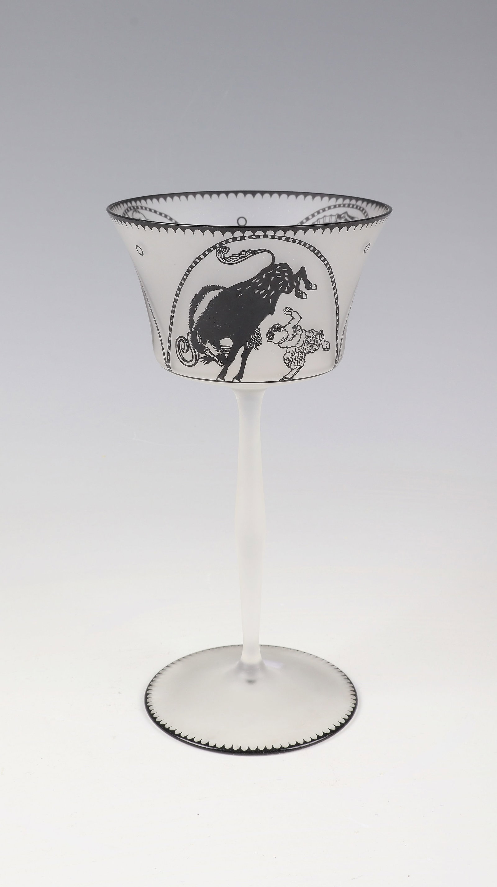 Rare Wine Glass with Fauns and Bulls: Rare wine glass with fauns and bulls Moritz Jung (design) for J. & L. Lobmeyr, Vienna 1911-1914 Colourless, silk-matt etched glass with black solder painting. Inscribed under the bottom with the Lobme