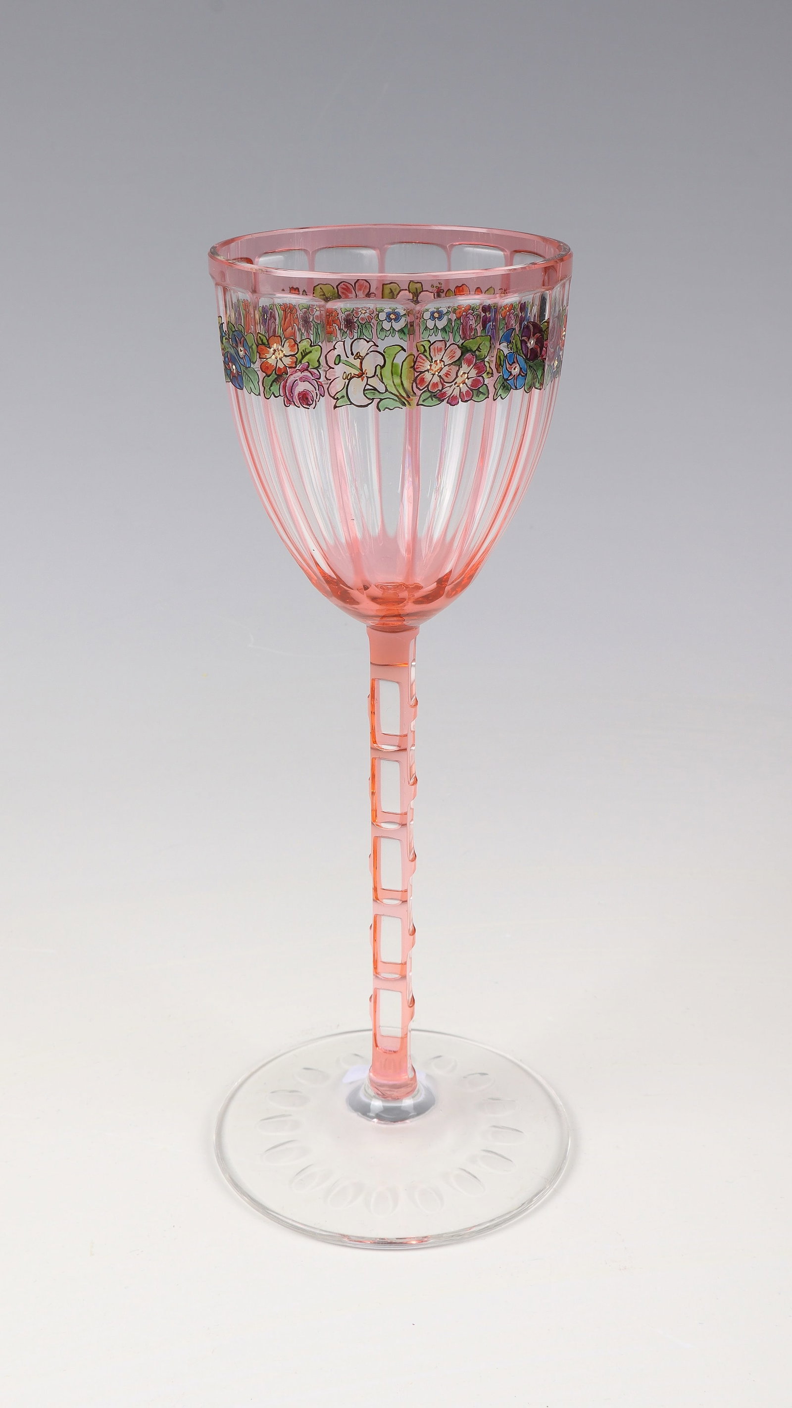 Wine glass: Otto Prutscher wine glass (design), Meyr's Nephew, Adolfhütte near Winterberg (execution), c. 1910 Colourless glass with a delicate pink overlay, reduced by geometric cut decoration. Facet and peel c