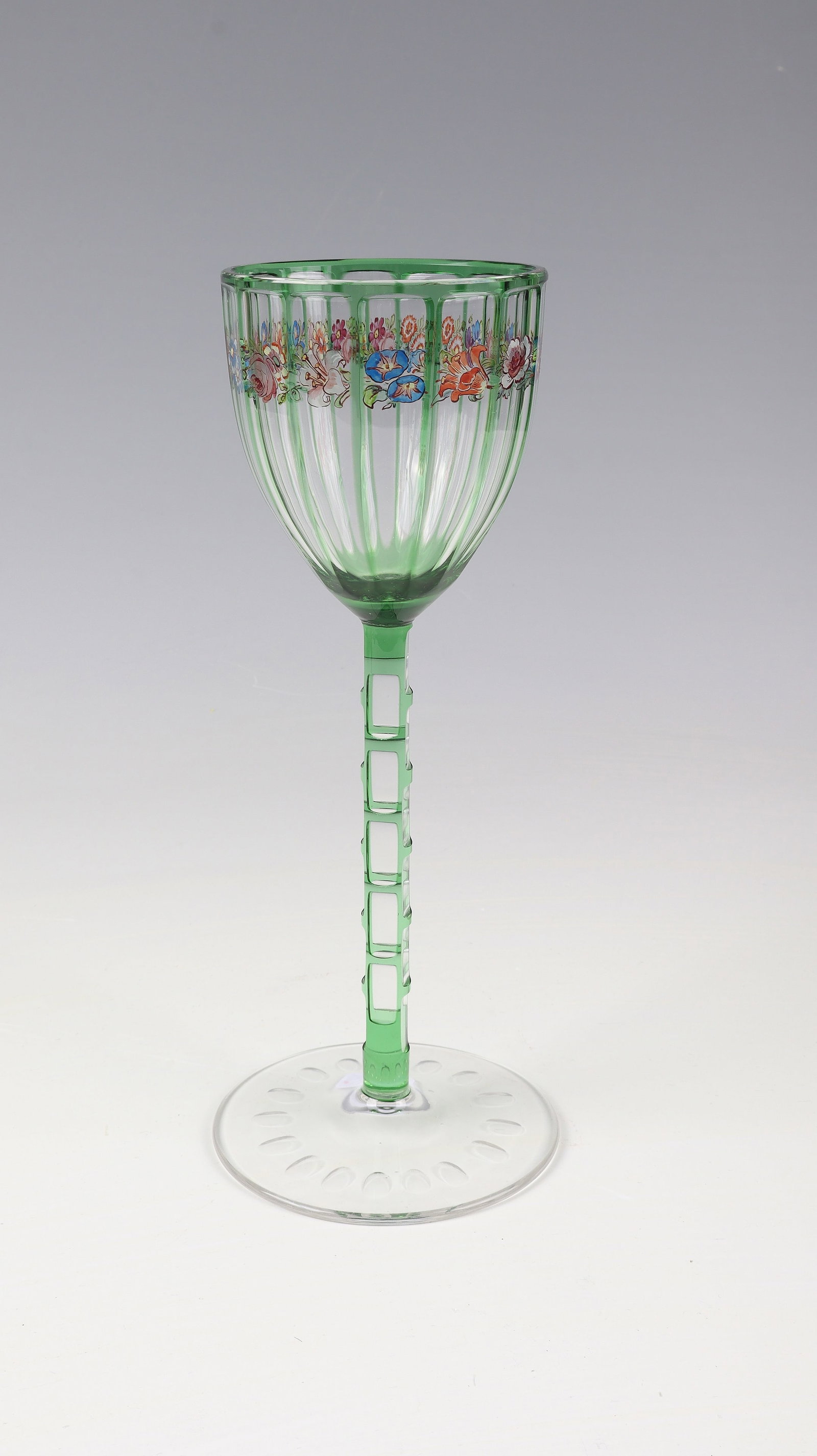 Wine glass: Otto Prutscher wine glass (design), Meyr's Nephew, Adolfhütte near Winterberg (execution), c. 1910 Colourless glass with a soft green overlay, reduced by geometric cut decoration. Facet and peel
