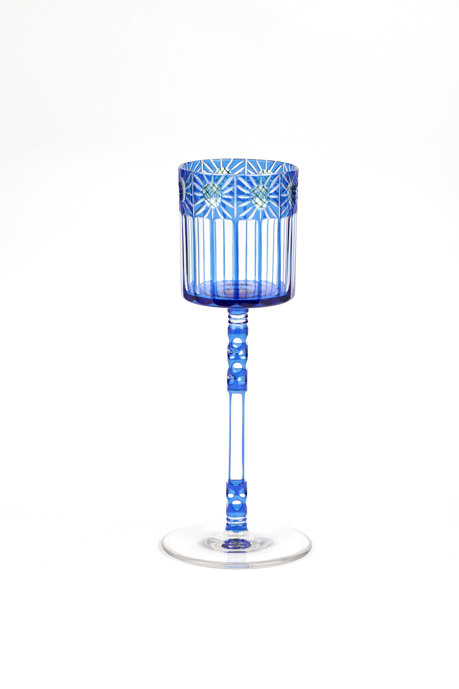 Wine glass: Otto Prutscher wine glass (design), Meyr's nephew, Adolf bei Winterberg (execution), ca. 1912 Colourless, cobalt blue overlaid glass, cut through. Cylindrical cuppa with sixteen-fold peel grind.