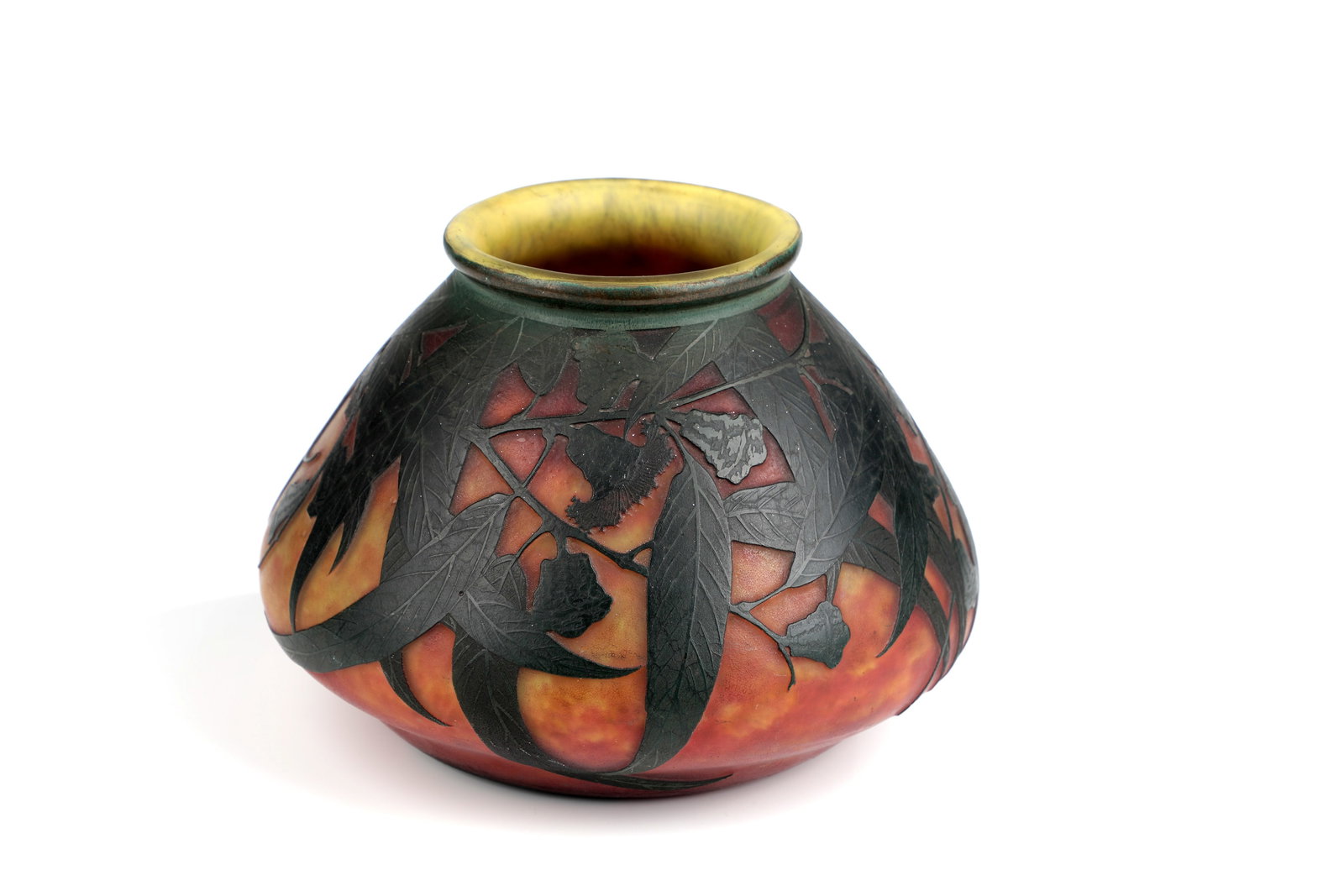 Vase ''Eucalyptus'': Vase ''Eucalyptus'' Daum Fréres, Nancy, c. 1913 Colourless glass, lemon yellow and orange powder melting and dark green overlay. Etched décor all around: eucalyptus branches with flowers and leaves.