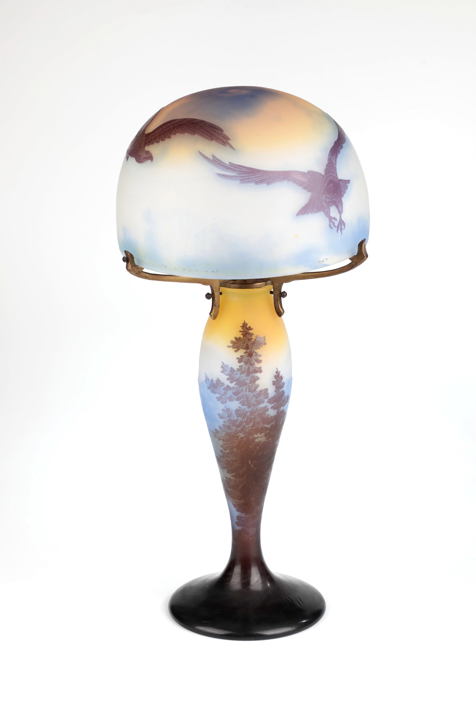 Table lamp ''Paysage avec un couple d'aigles'': Table lamp ''Paysage avec un couple d'aigles'' Etablissements Gallé, Nancy, 1908-1920 Colourless glass, partially underlaid with light yellow on the inside, overlaid in light blue, light and dark pur