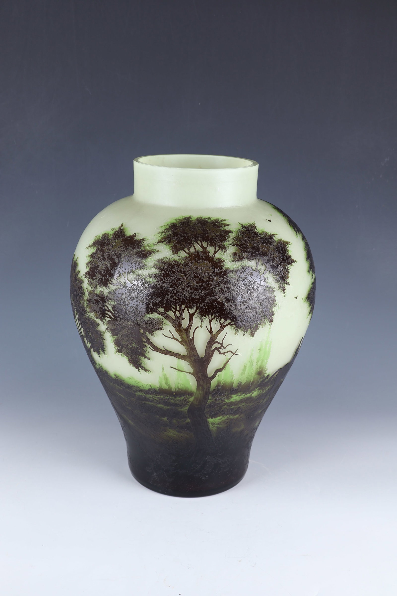 Vase with riders: Vase with riders Loetz Wwe., Klostermühle, dated 1927 Colourless glass with delicate green opal underlay, grass-green and brown overlay. Etched decoration in relief: elegantly dressed riding couples 