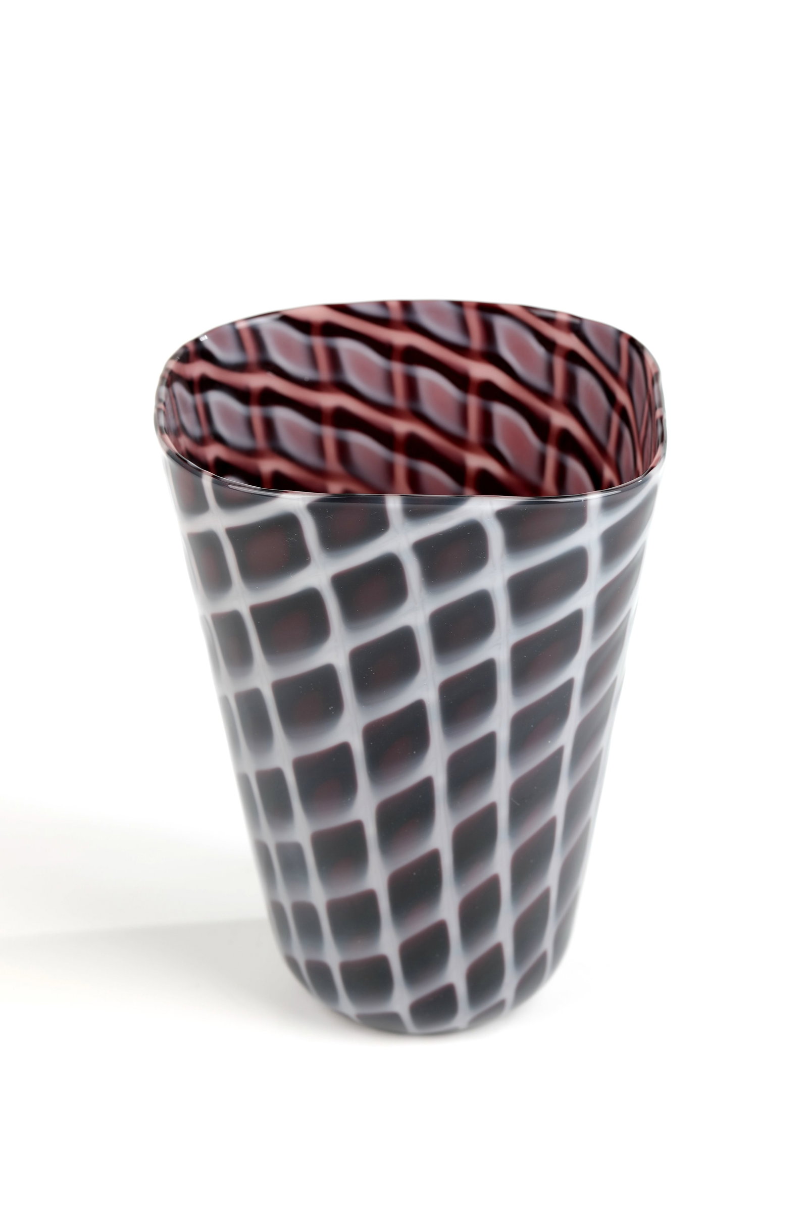Vase ''A Losanghe'': Vase ''A Losanghe'' Archimede Seguso, Murano, 1951 Colourless glass with closely melted rectangular plates in violet and white opal. In the bottom adhesive label: MADE IN MURANO. H. 21 cm Lit.: U. Fra