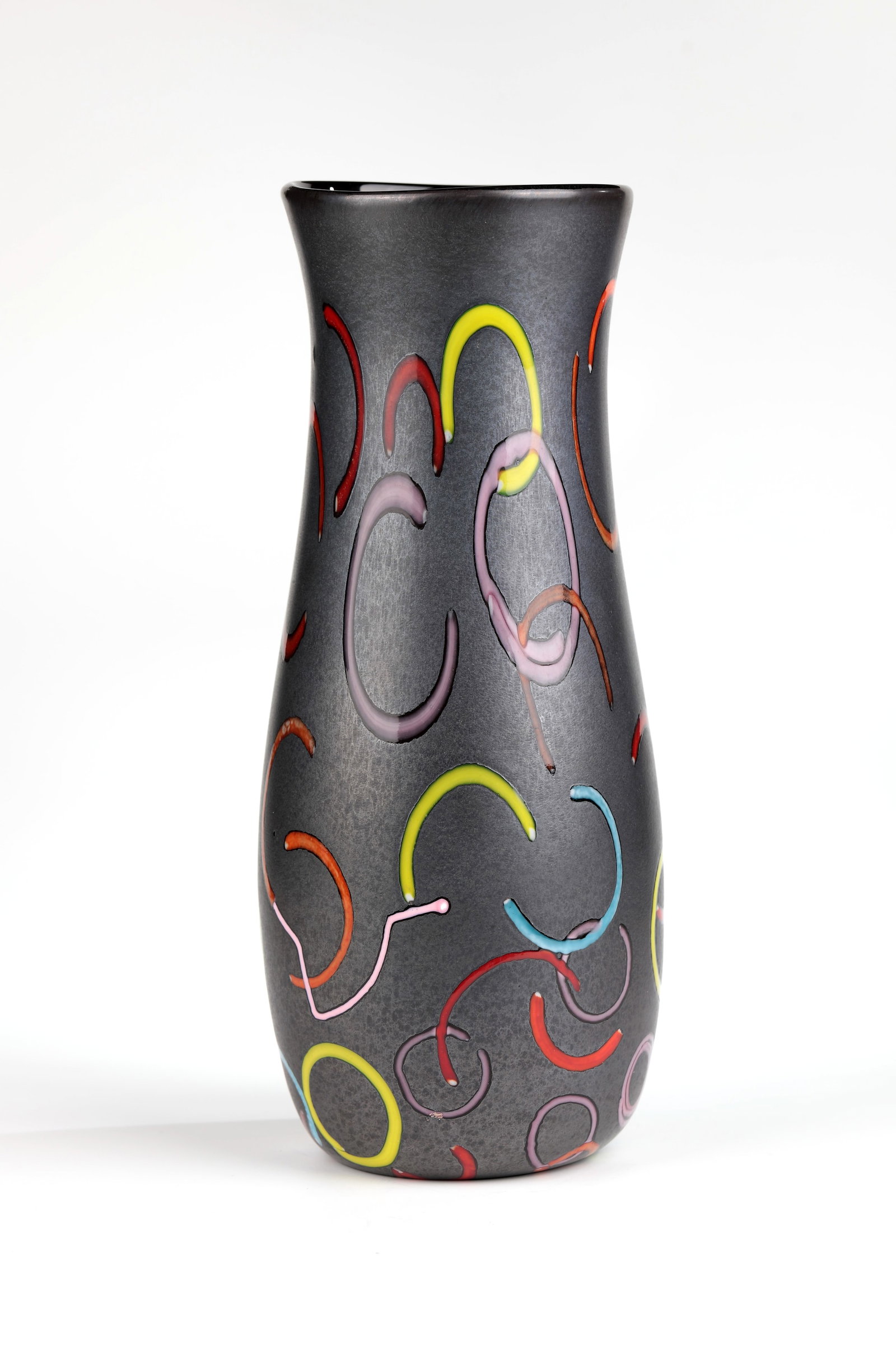 Vase ''Nerox a cerchi policromi'': Vase ''Nerox a cerchi policromi'' Ermanno Toso (design), Fratelli Toso, c. 1954 Colourless glass with black-violet crumb melting. Surface black metallic shimmering ('Nerox'). Scattered melted murrine 