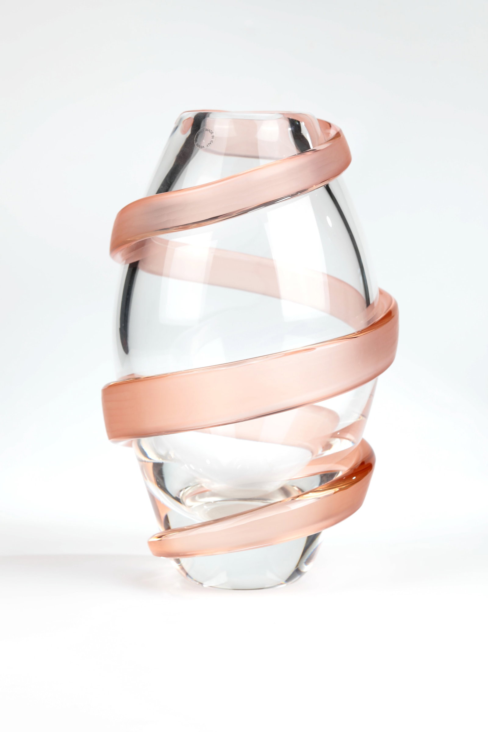 Vase ''Novecentotrentasei'': Vase ''Novecentotrentasei'' Venini, Murano, 1993 Colourless glass. Spiral ribbon decoration made of rose-coloured glass followed by a cut. Original adhesive label from the manufactory. Engraved