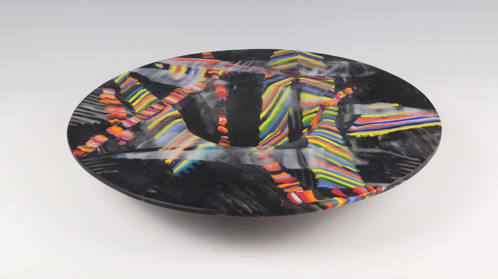 Large Mosaic Plate: Large mosaic plate Klaus Moje, 1992 mosaic glass technique. Fused from prefabricated multi-coloured glass rods, with carved structures, ground and semi-gloss polished. Signed and dated in diamond crac